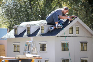 Volunteers give a makeover to Tiny Town’s century-old miniatures