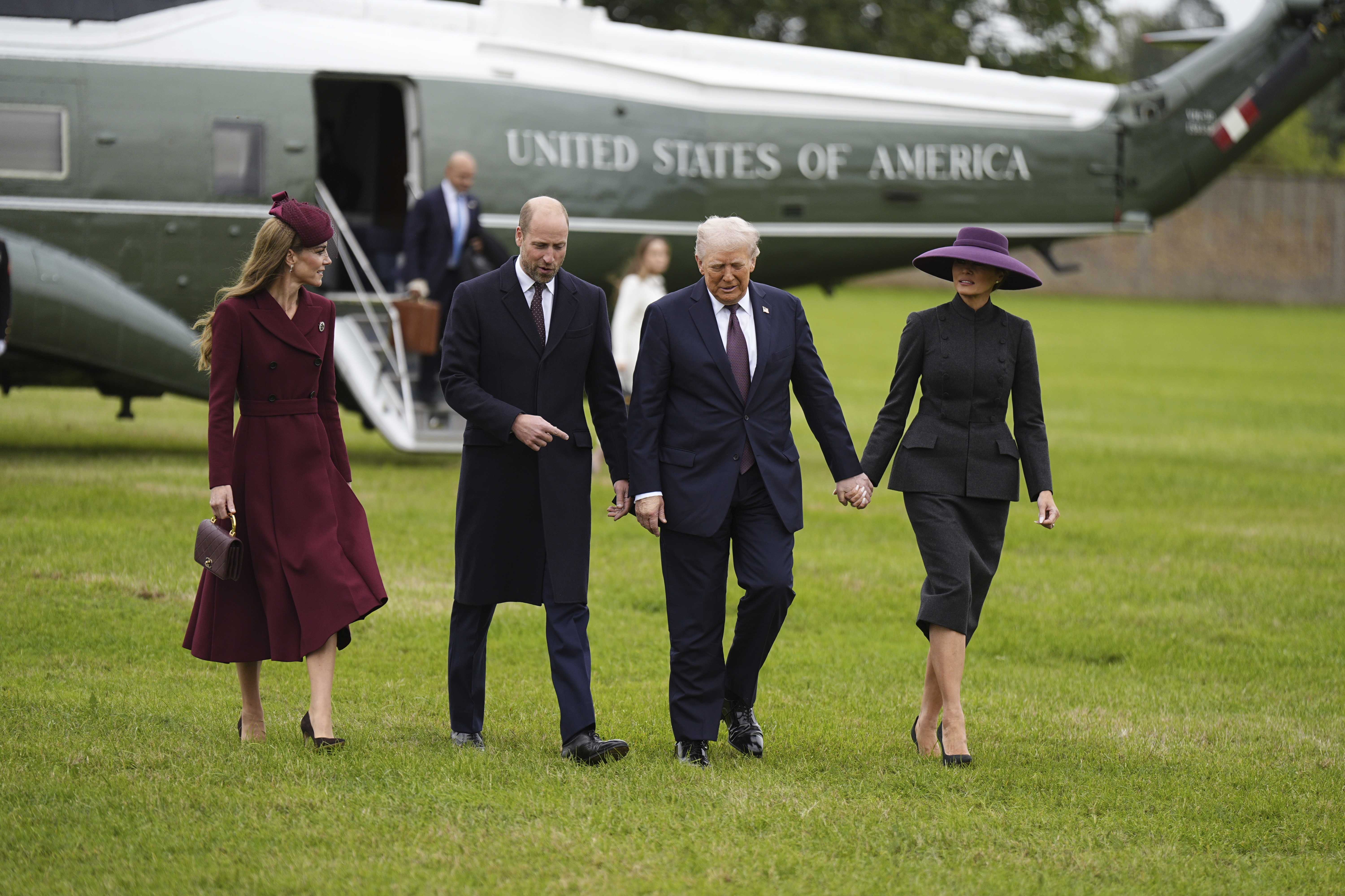 Britain's Prince William and Kate, Princess of Wales, left, receive President Donald Trump and first lady Melania Trump at Windsor Castle in Windsor, England, Wednesday Sept. 17, 2025. (Aaron Chown - Pool PA)