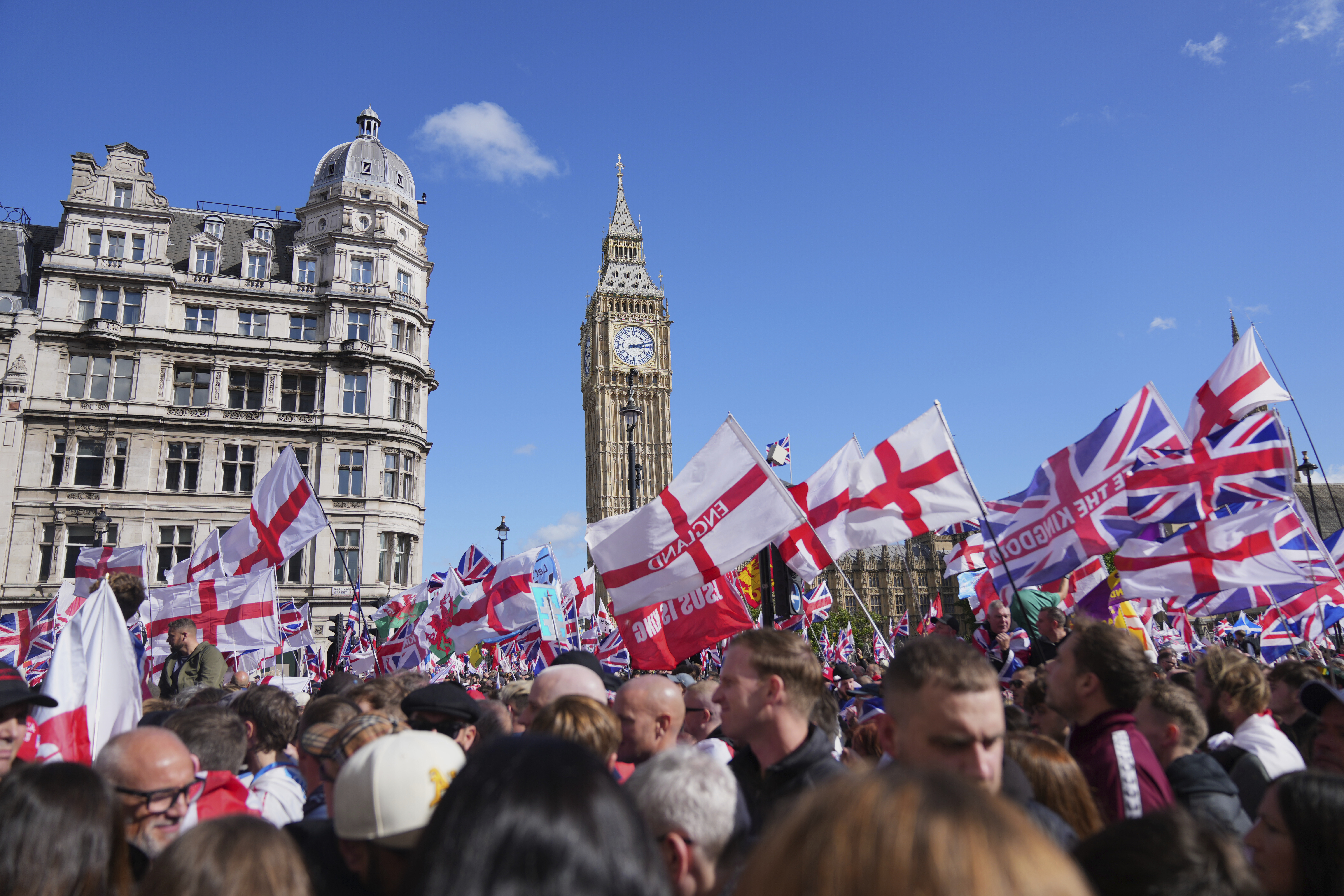 People demonstrate during the Tommy Robinson-led Unite the Kingdom march and rally, in London, Saturday Sept. 13, 2025. (Joanna Chan - AP)