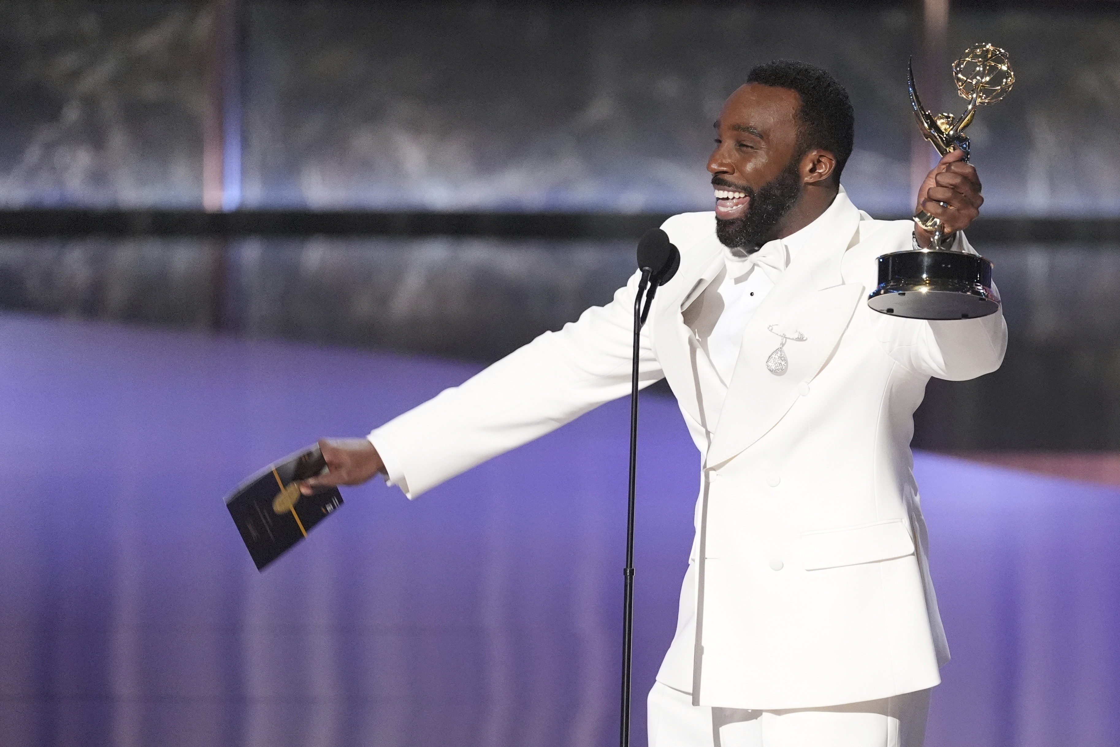 Tramell Tillman accepts the award for outstanding supporting actor in a drama series for 