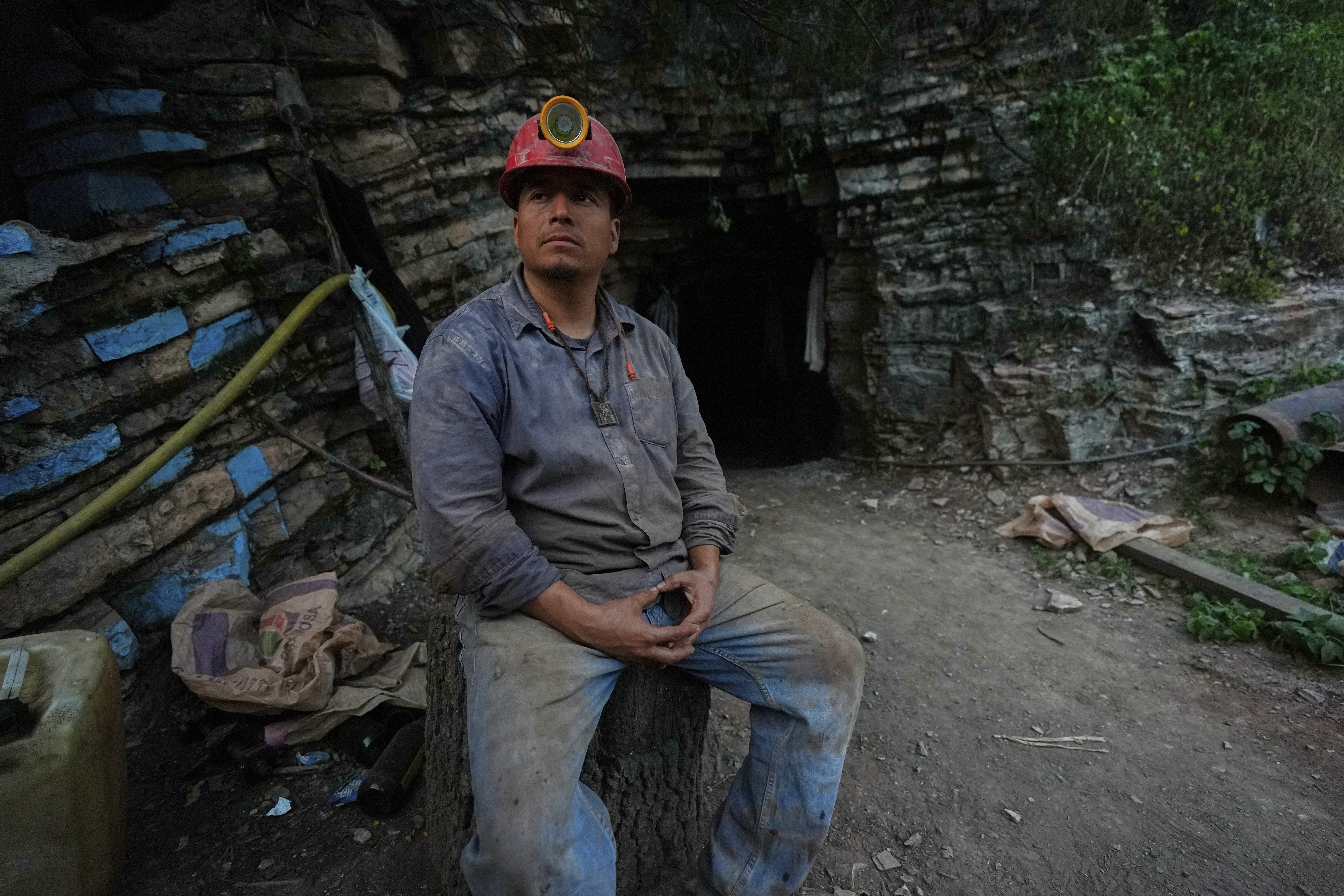 Hugo Flores poses for a photo just outside the mercury main entrance in San Joaquin, Mexico, Tuesday, Aug. 19, 2025. (Fernando Llano - AP)
