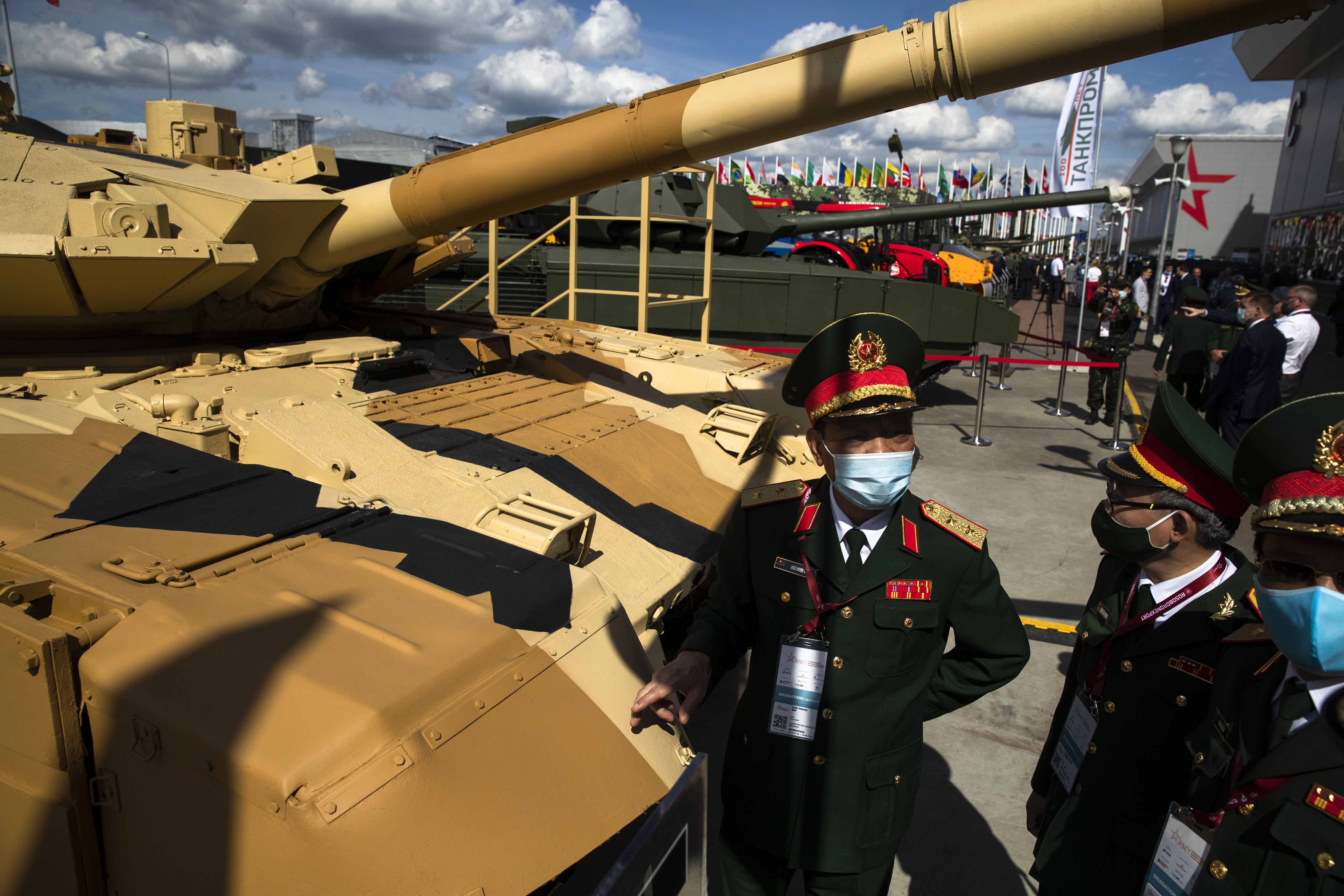 FILE - Military visitors from Vietnam observe the Russian T-90MS tank during the International Military Technical Forum Army-2020 in Alabino, outside Moscow, Russia, on Aug. 23, 2020. (Pavel Golovkin - AP)