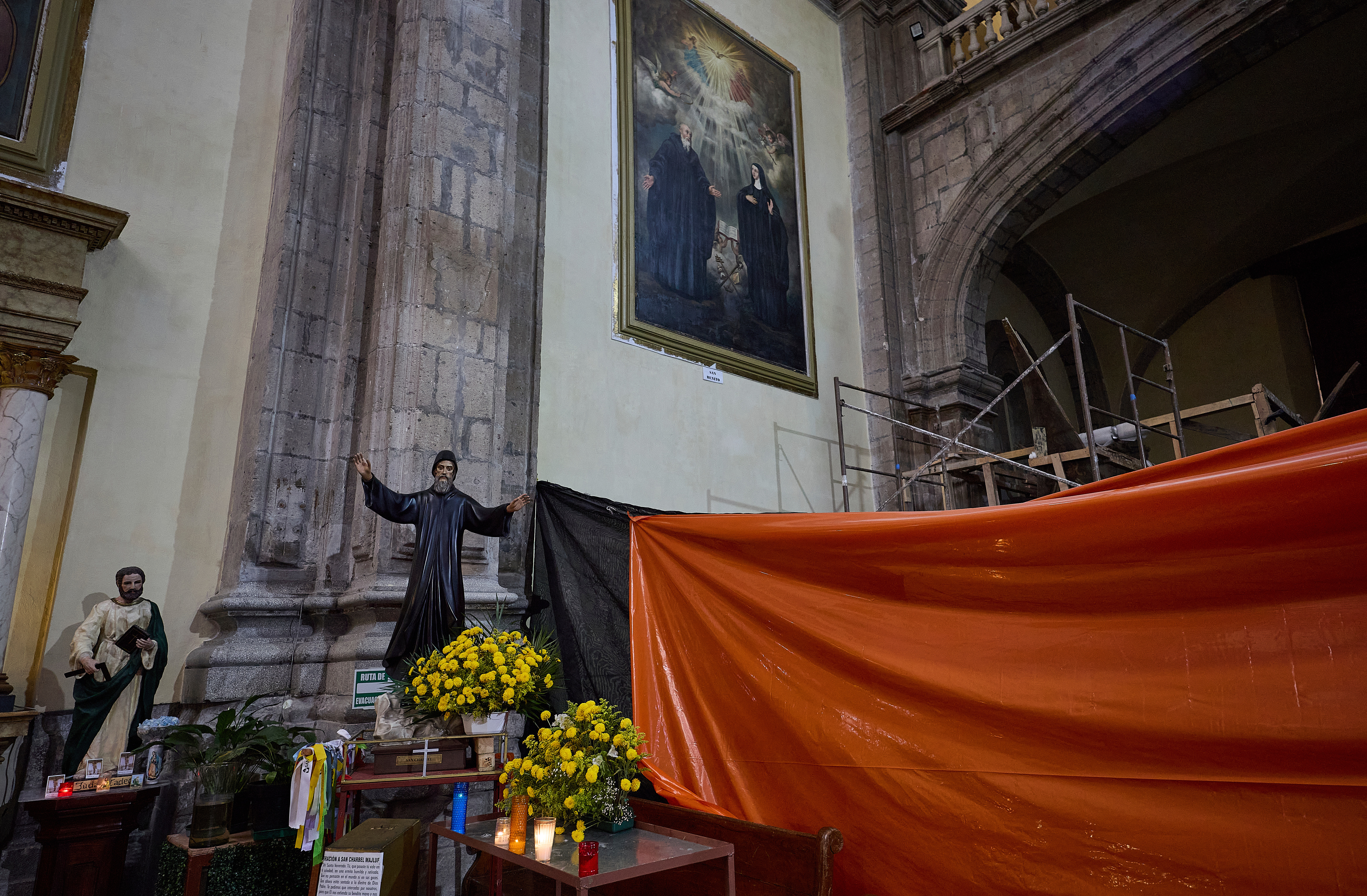 Tarps and scaffolding are used for repairs inside San Juan de Dios church in Mexico City, Friday, Sept. 19, 2025. The church withstood the 8.0 earthquake of 1985, however, its structure was severely damaged in 2017 and it was forced to shut down and reopened in late 2024 after most of its restoration was completed. (Ginnette Riquelme - AP)