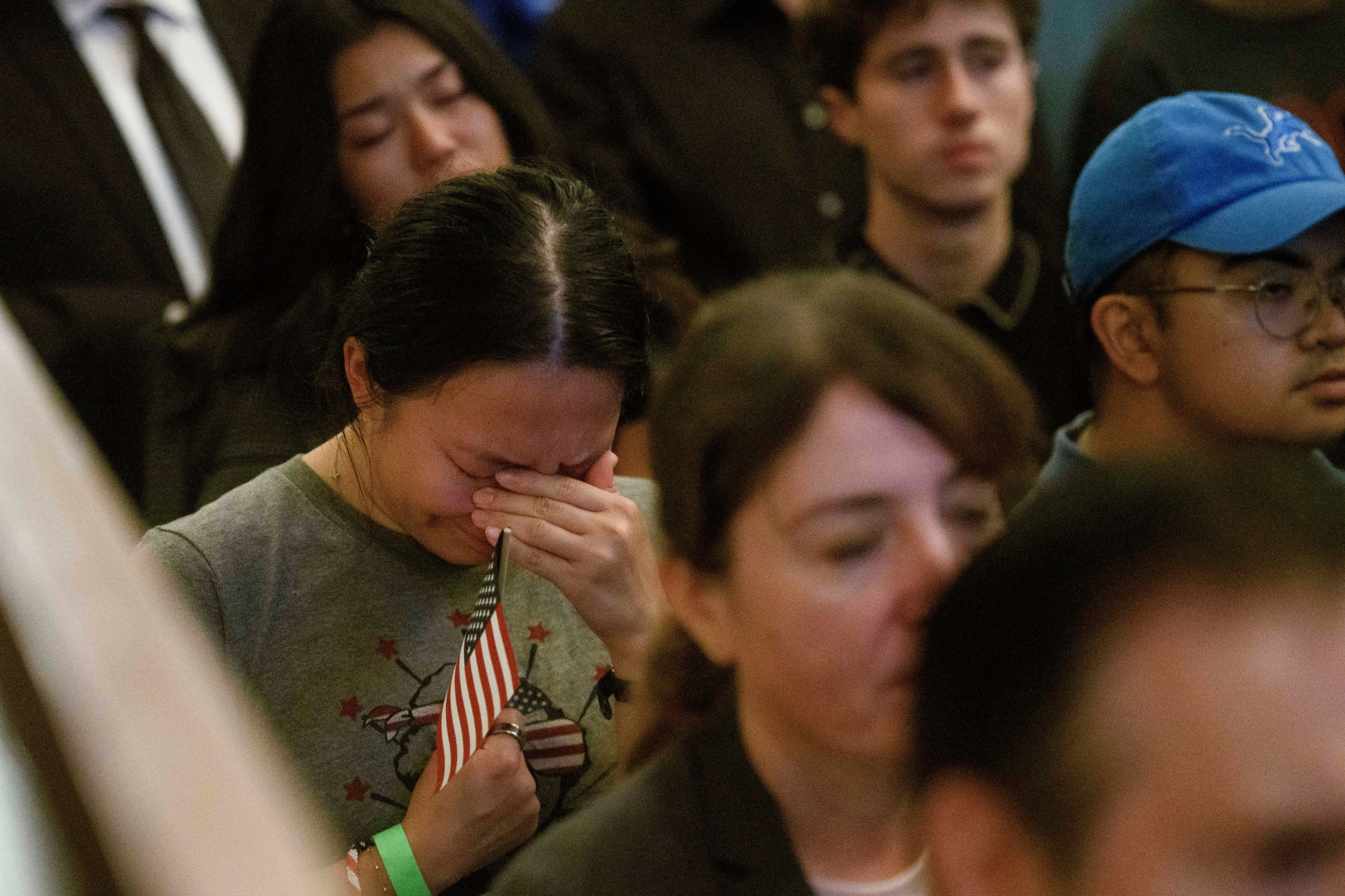 People sing and pray during a memorial and prayer vigil for Charlie Kirk at the John F. Kennedy Memorial Center for the Performing Arts, Sunday, Sept. 14, 2025, in Washington. (Rod Lamkey - FR172078)
