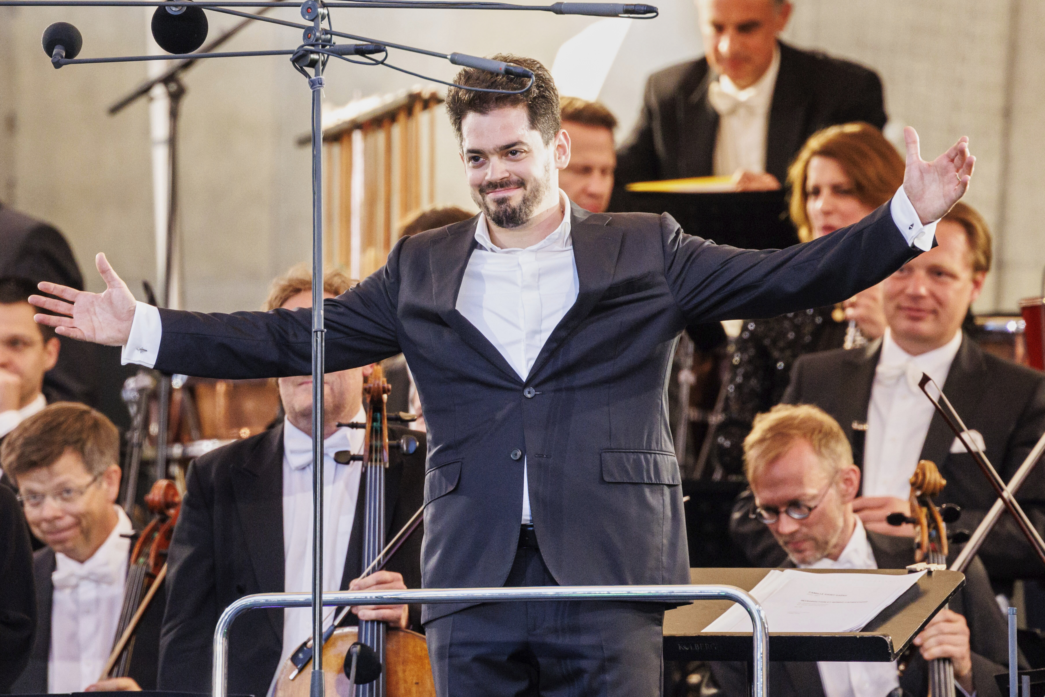 Israeli conductor Lahav Shani is onstage at the Munich Philharmonic's 'Klassik am Odeonsplatz' concert, in Munich, Germany, July 13, 2024. (Matthias Balk - DPA)