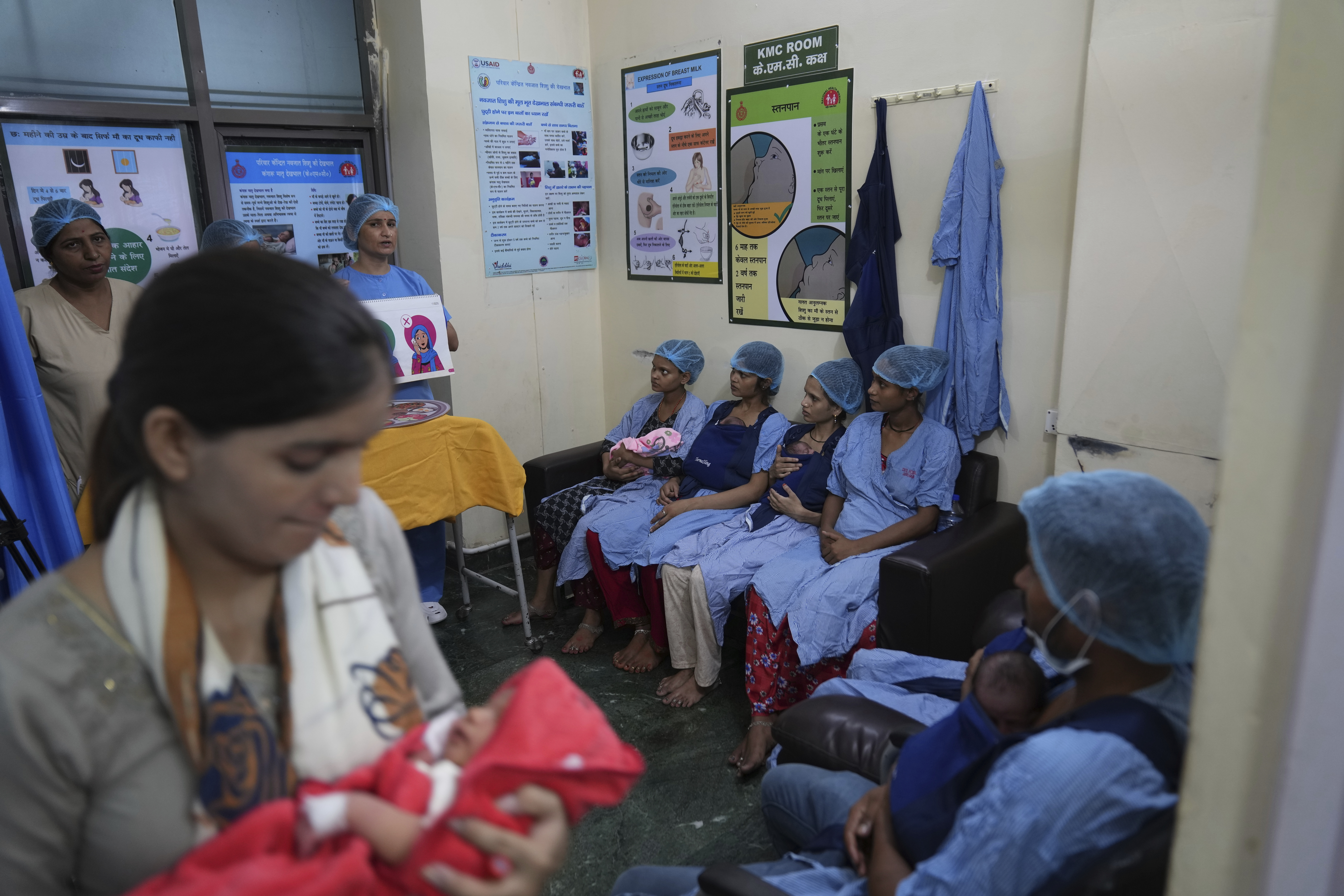 Nurses conduct a training for mothers whose newborns who were born premature or are sick in an intensive care unit of a government hospital in Gurugram, a satellite city of New Delhi, India, on Aug. 7, 2025. (Manish Swarup - AP)
