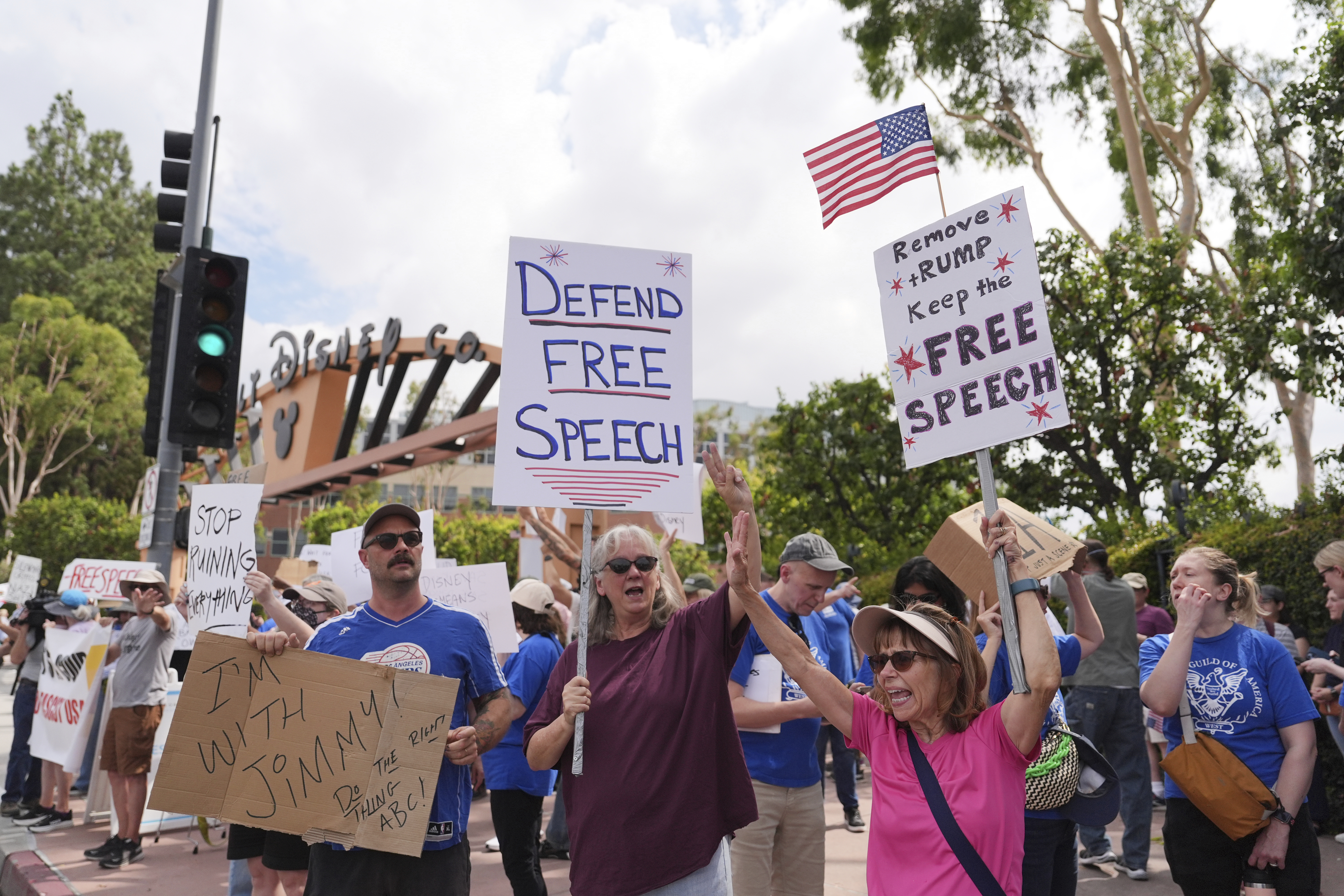 Demonstrators picket in response to the suspension of Jimmy Kimmel's late-night show outside of Walt Disney Studios in Burbank, Calif., on Thursday, Sept. 18, 2025. (Jae C. Hong - AP)