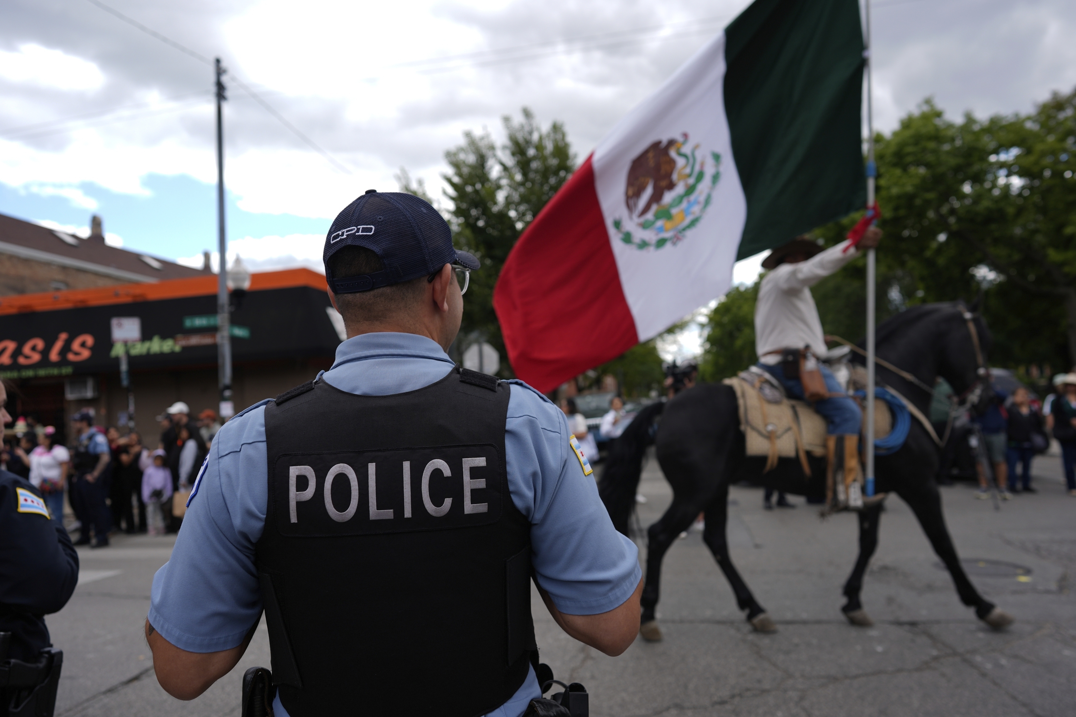 Chicagoans change routines as immigration crackdown looms. Some carry passports and avoid stores