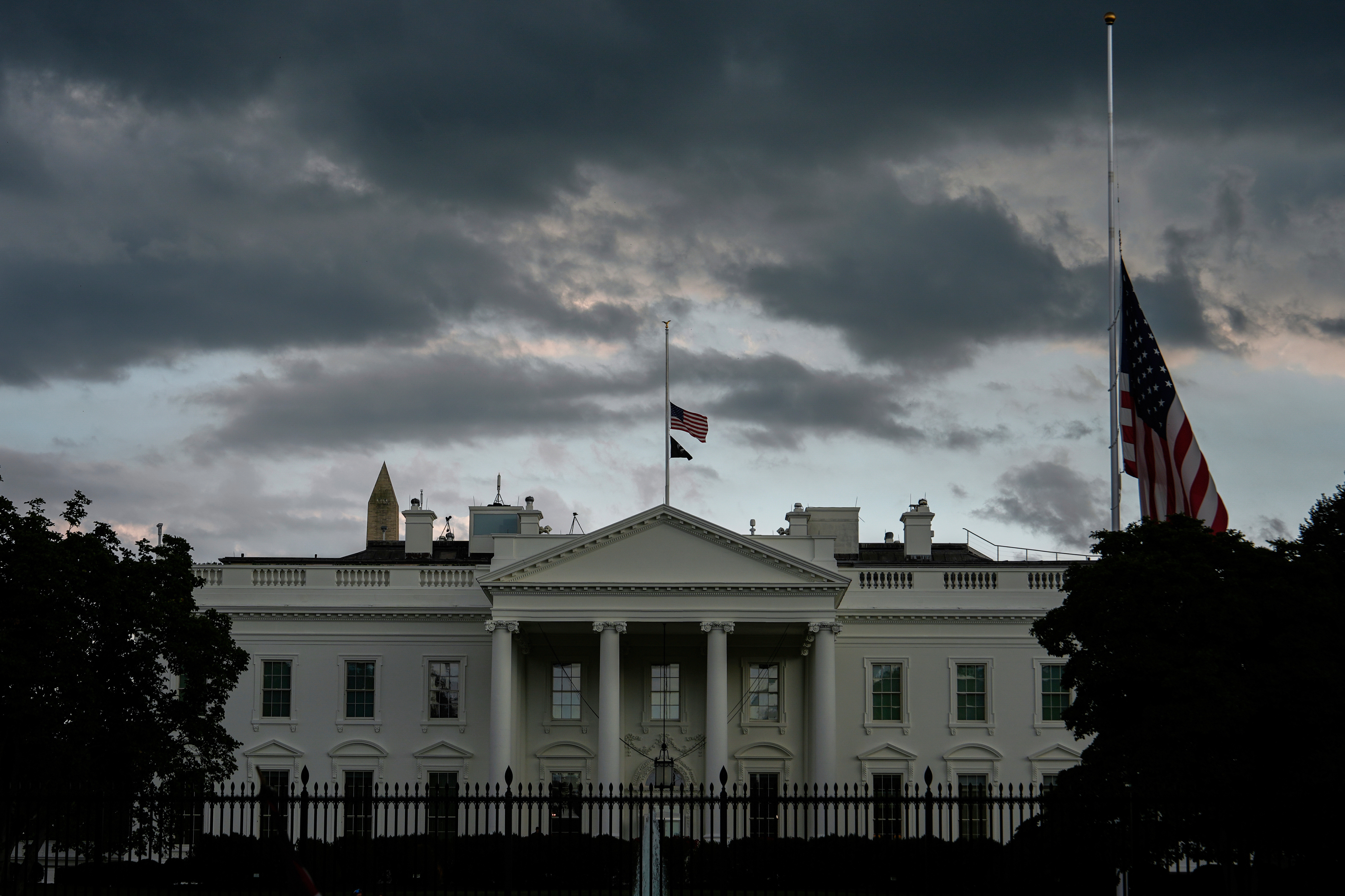 American flags at the White House fly at half-staff after the death of Charlie Kirk, the CEO and co-founder of Turning Point USA, Thursday, Sept. 11, 2025, in Washington. (Julia Demaree Nikhinson - AP)