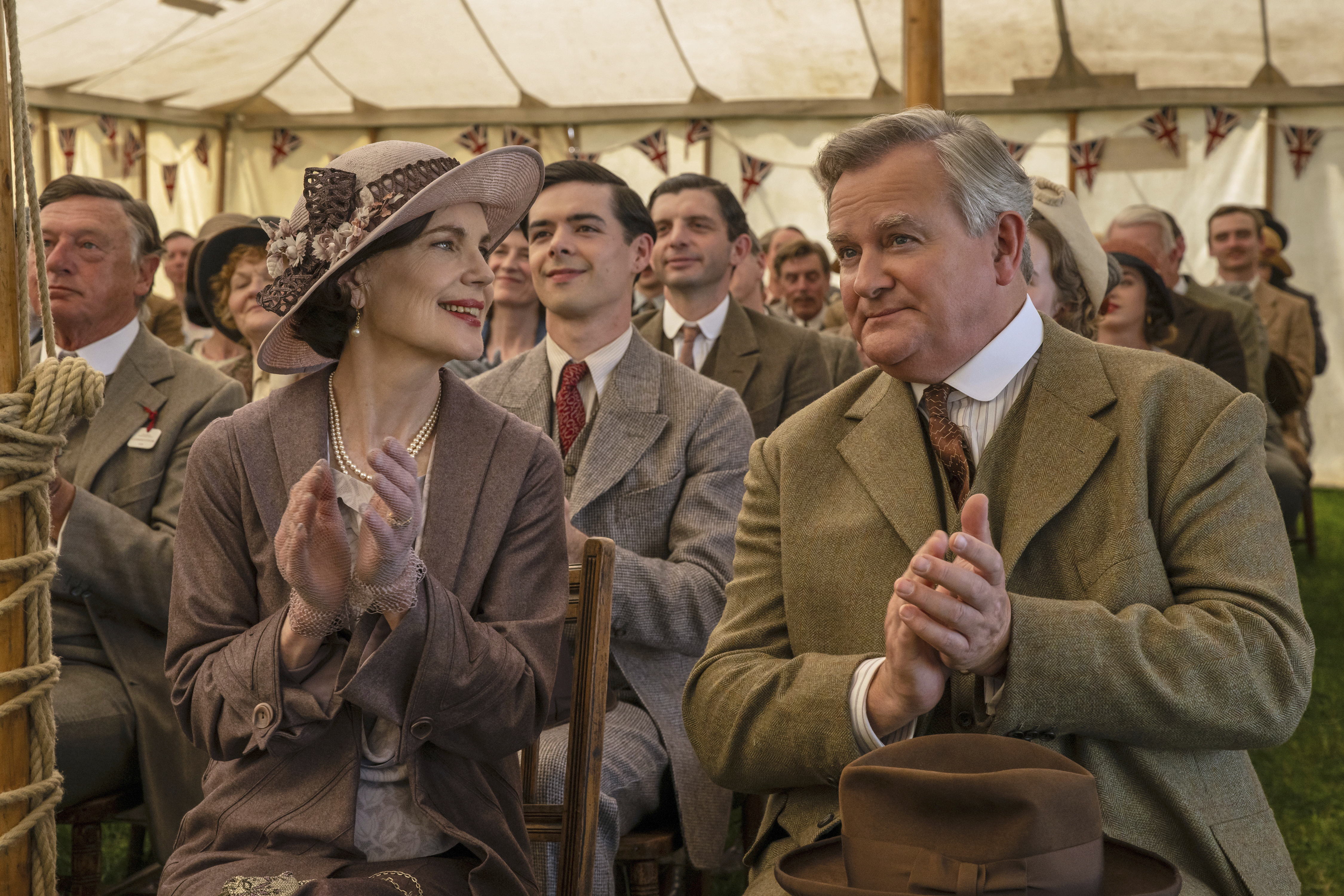This image released by Focus Features shows Elizabeth McGovern, left, and Hugh Bonneville in a scene from the film 