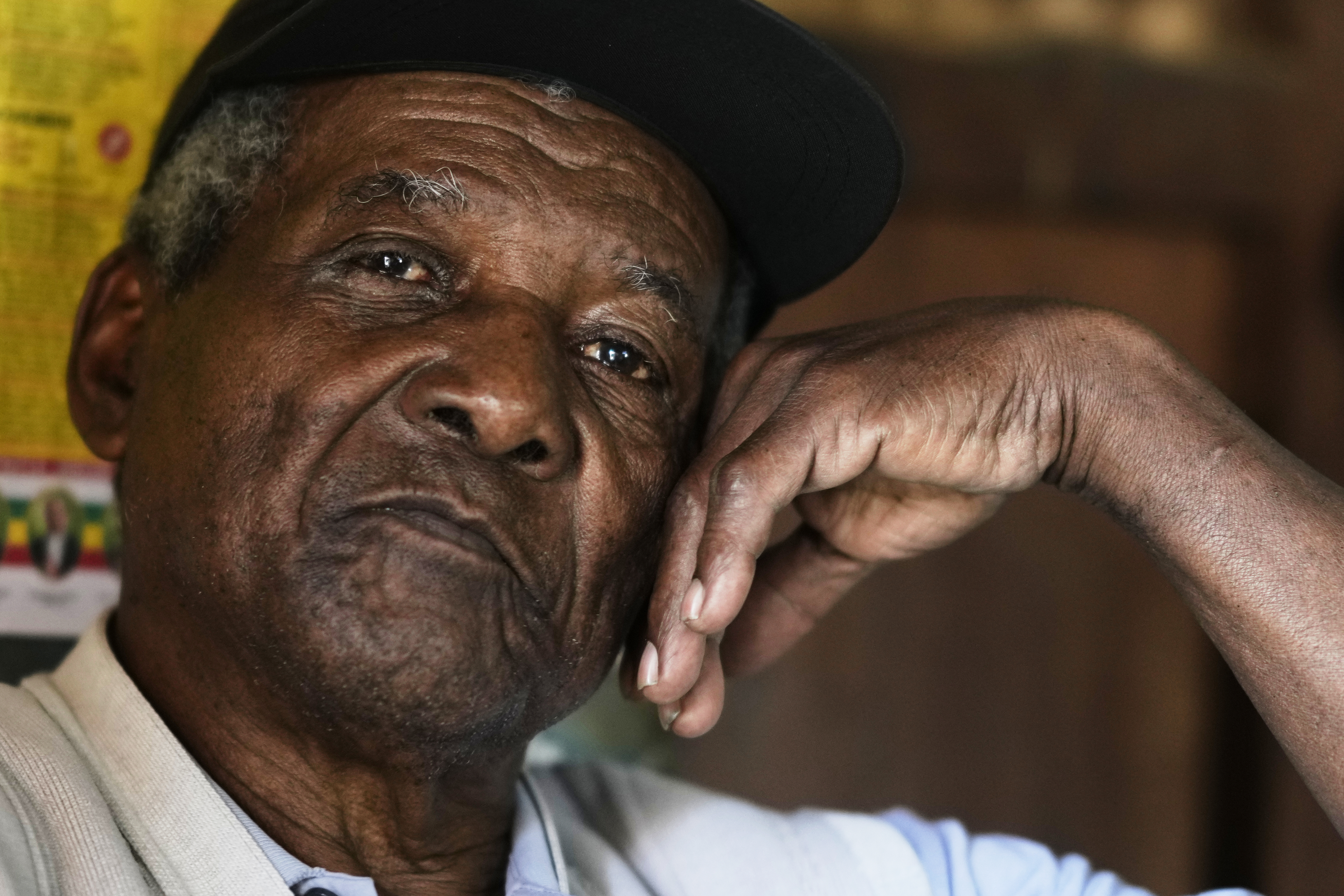 Julio Pinedo, a symbolic leader regarded as the king of the Afro-Bolivians, pauses during an interview at his home in Mururata, Bolivia, Sunday, Aug. 3, 2025. (Juan Karita - AP)