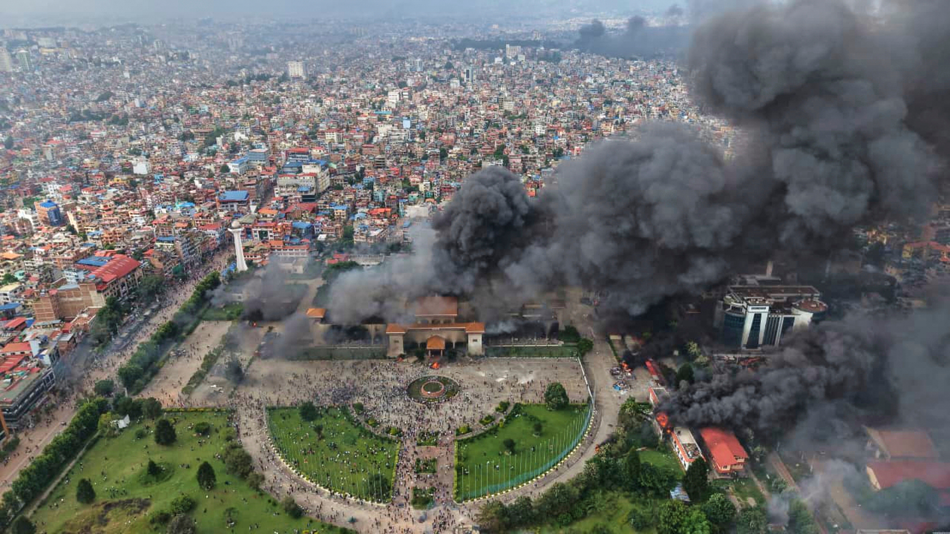 Photos show violent protests in Nepal, with government buildings set on fire