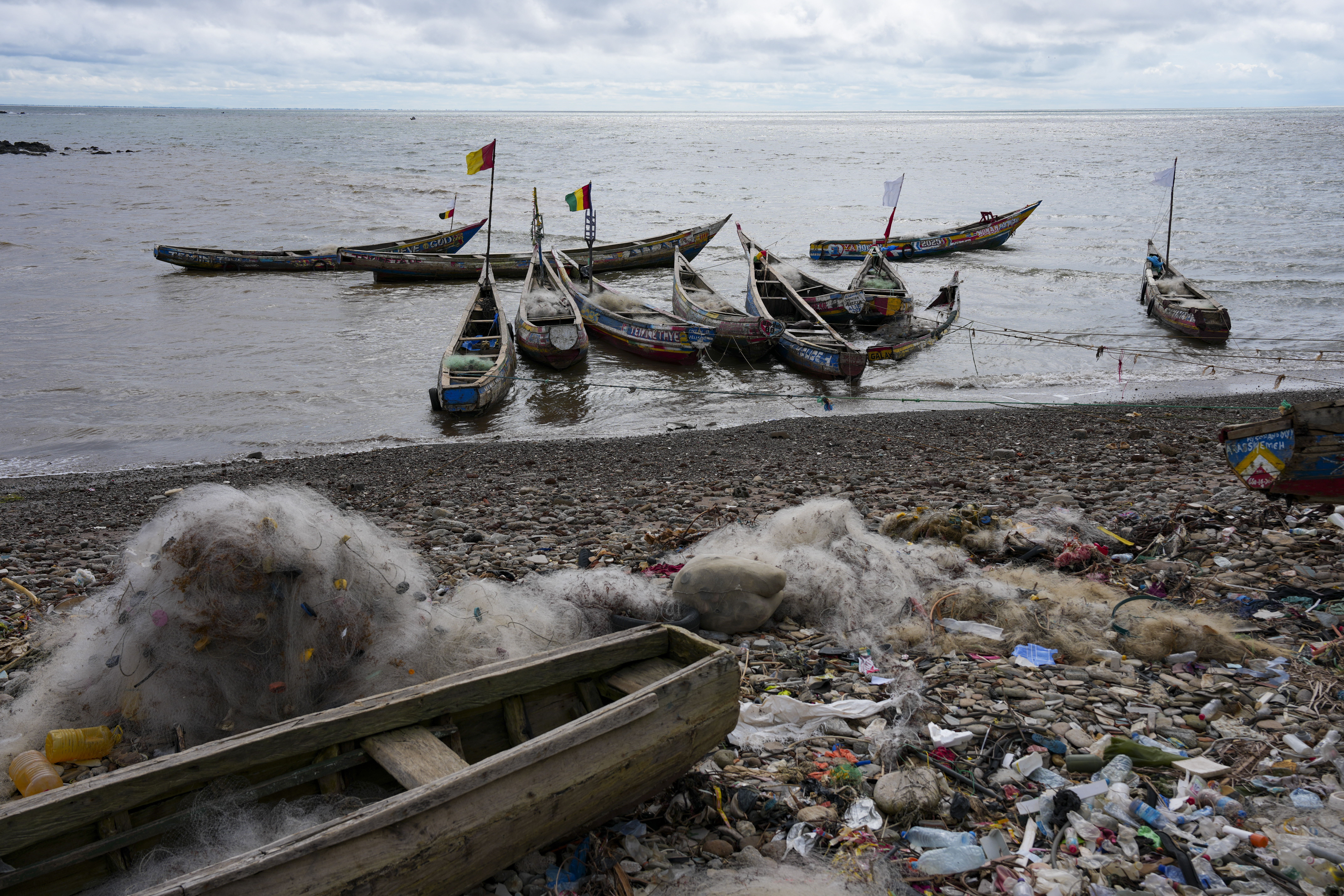 Fishing boats are anchored along the shore in Conakry, Guinea, Friday, Sept. 19, 2025 (Misper Apawu - AP)