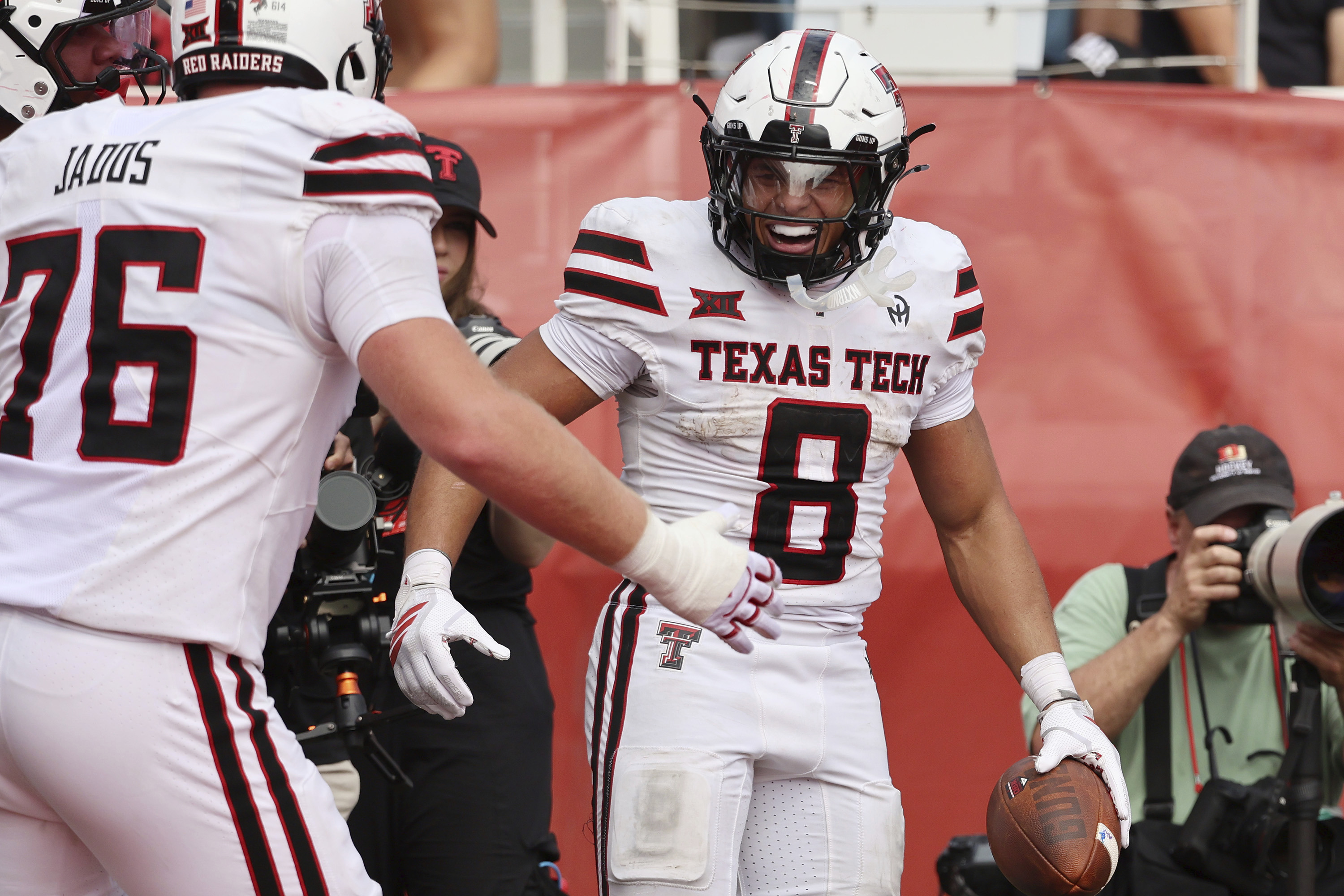 Texas Tech running back Cameron Dickey celebrates a touchdown against Utah during the second half of an NCAA college football game Saturday, Sept. 20, 2025, in Salt Lake City, Utah. (Jeffrey D. Allred - FR172281 AP)