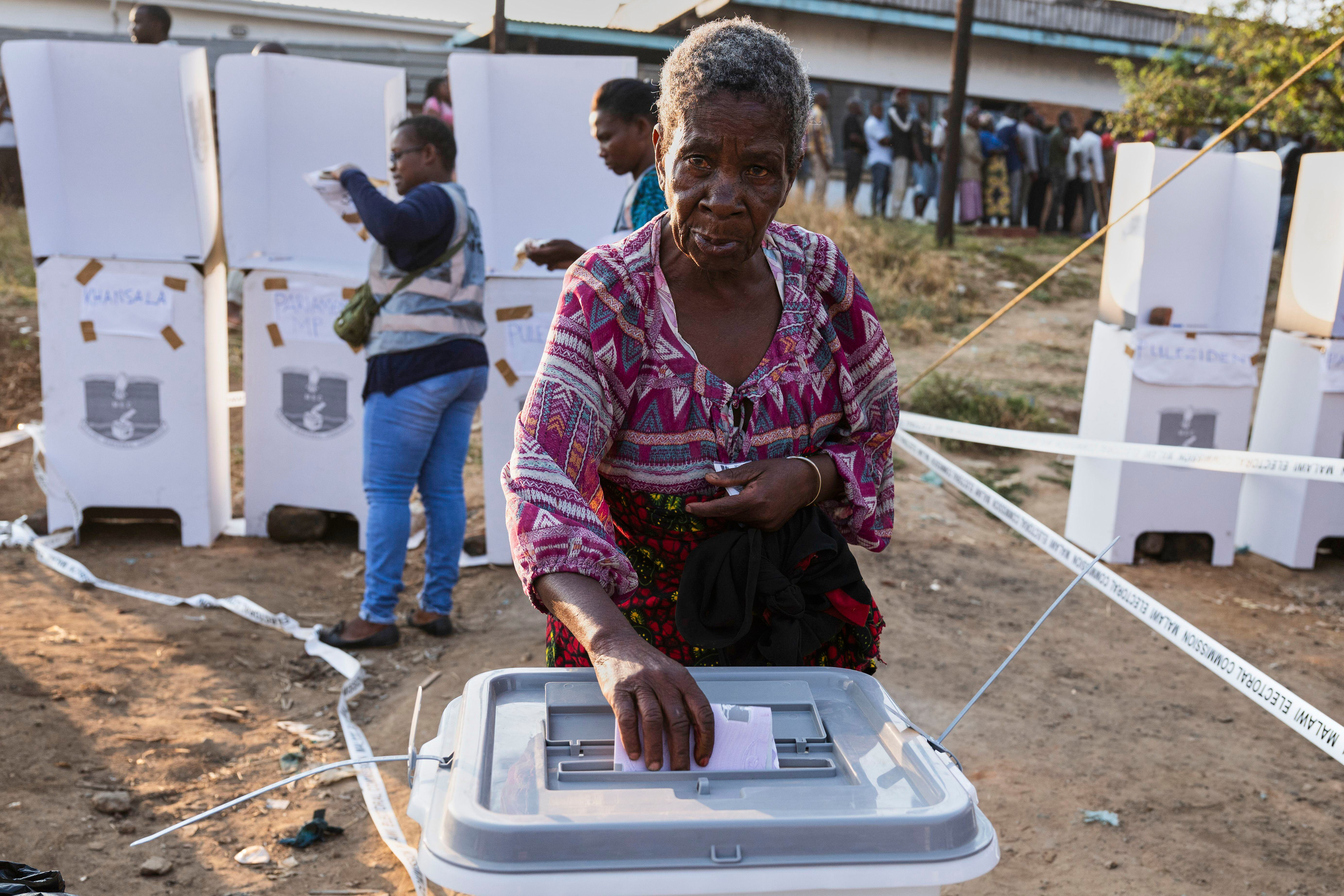 An elderly woman casts her vote during the elections, where the country will choose a president, lawmakers and local government representatives, in Blantyre, Malawi, Tuesday, Sept. 16, 2025. (Thoko Chikondi - AP)