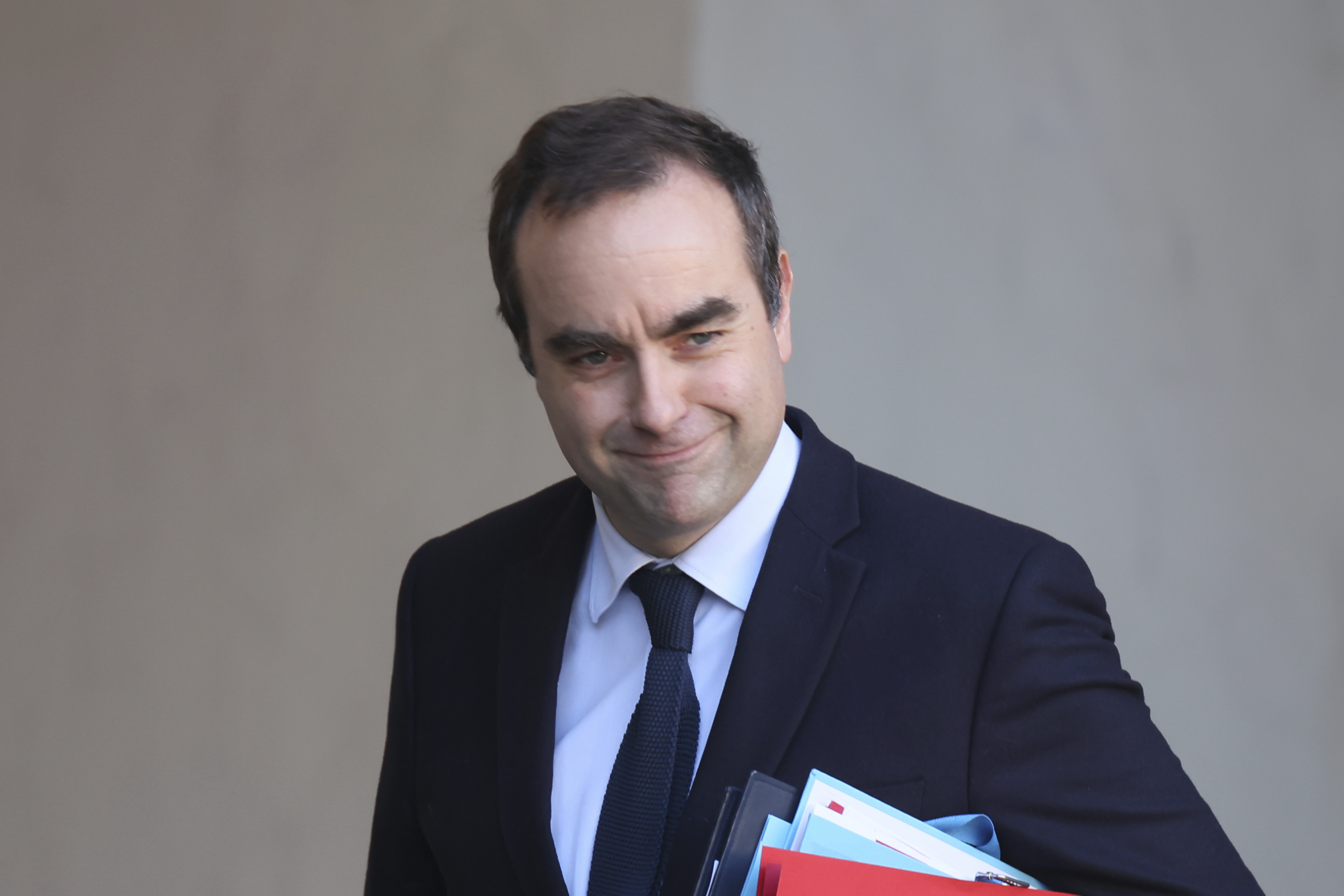 FILE - French Defense Minister Sebastien Lecornu leaves the first cabinet meeting of the new government, at the Elysee Palace in Paris, Friday, Jan. 3, 2025. (Thomas Padilla - AP)