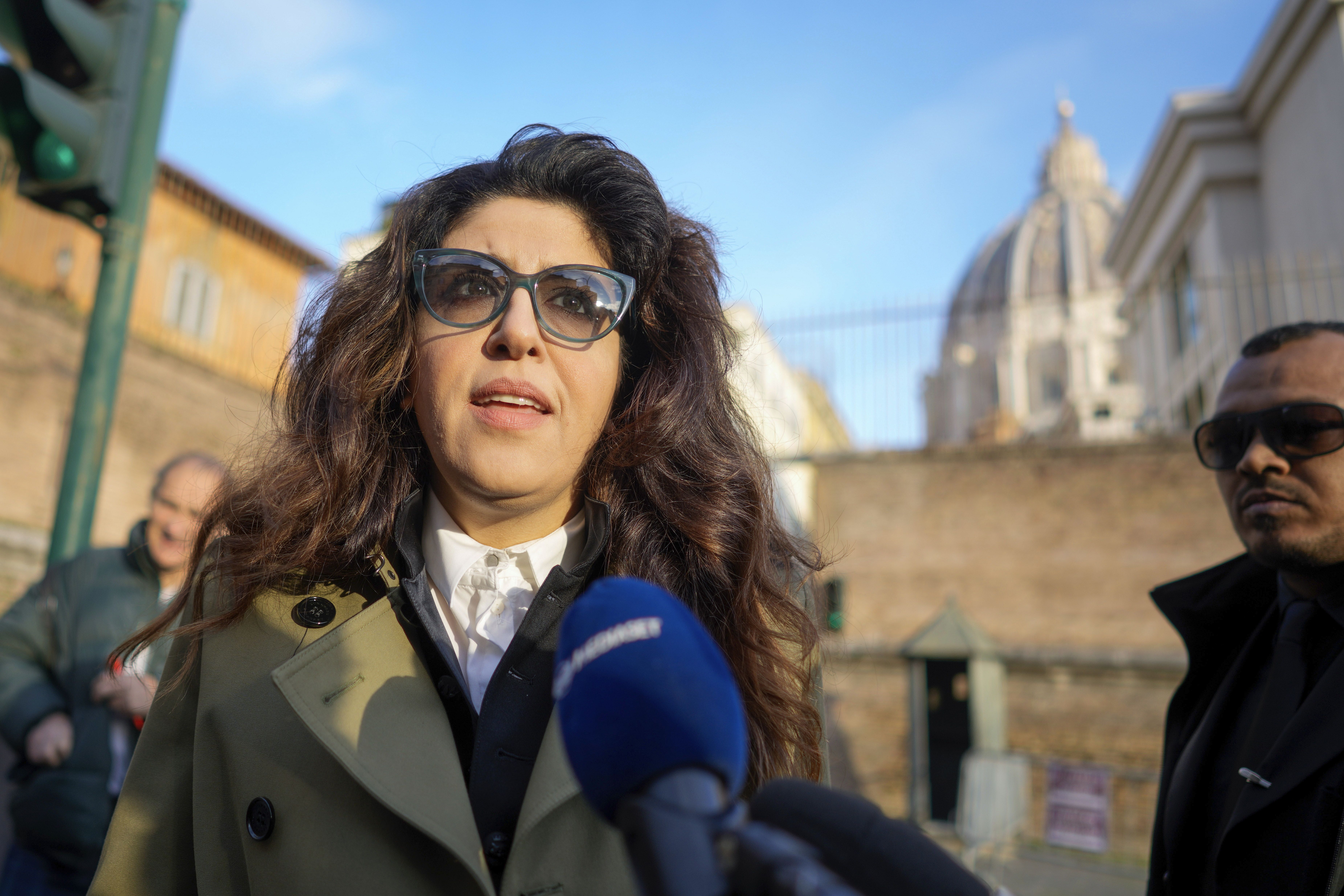FILE - Public relations specialist Francesca Chaouqui talks to reporters as she arrives to testify in a trial at the Vatican, Jan. 13, 2023. (Andrew Medichini - AP)