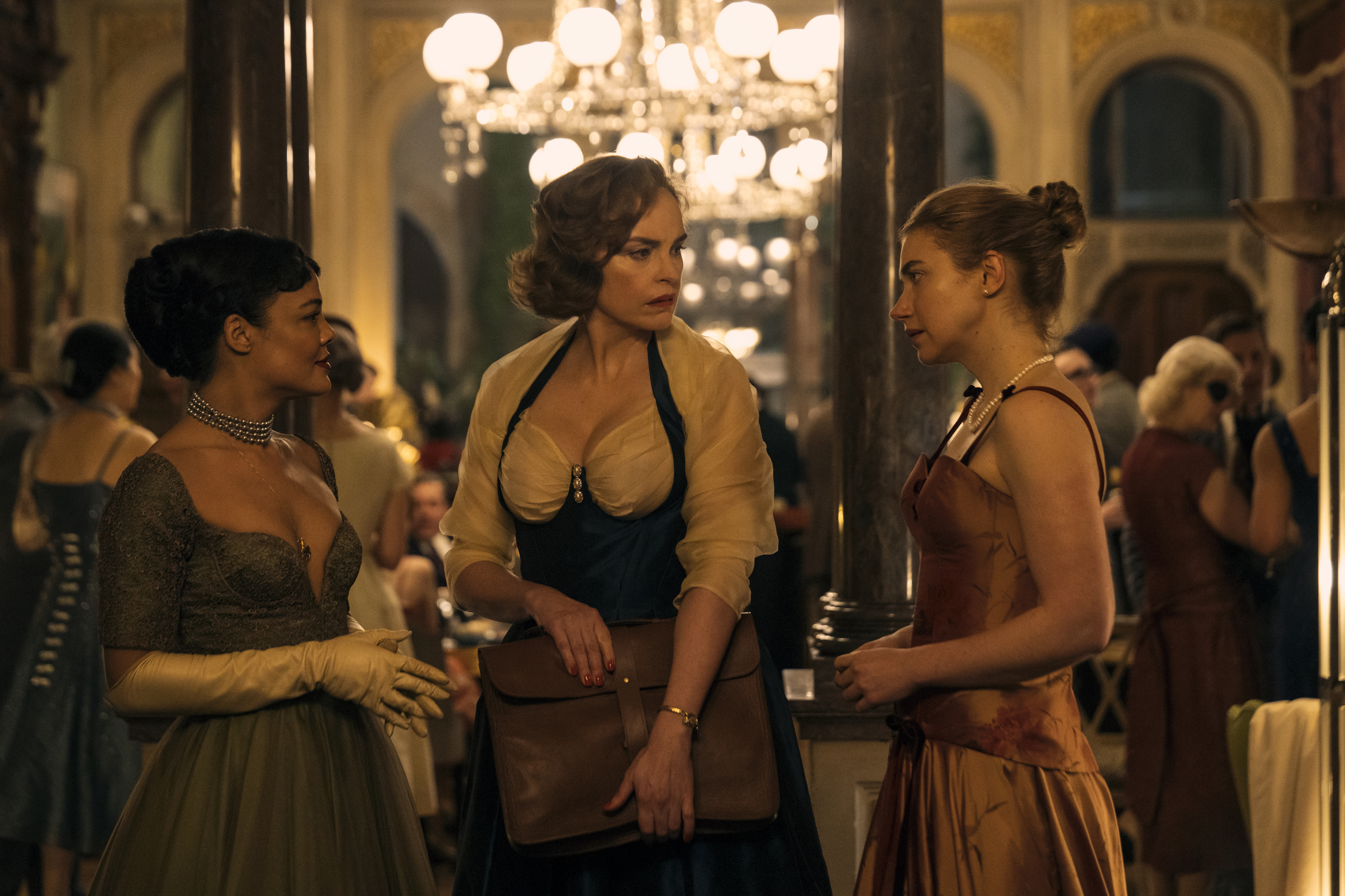 This image released by Amazon Prime shows Tessa Thompson, from left, Nina Hoss and Imogen Poots in a scene from 