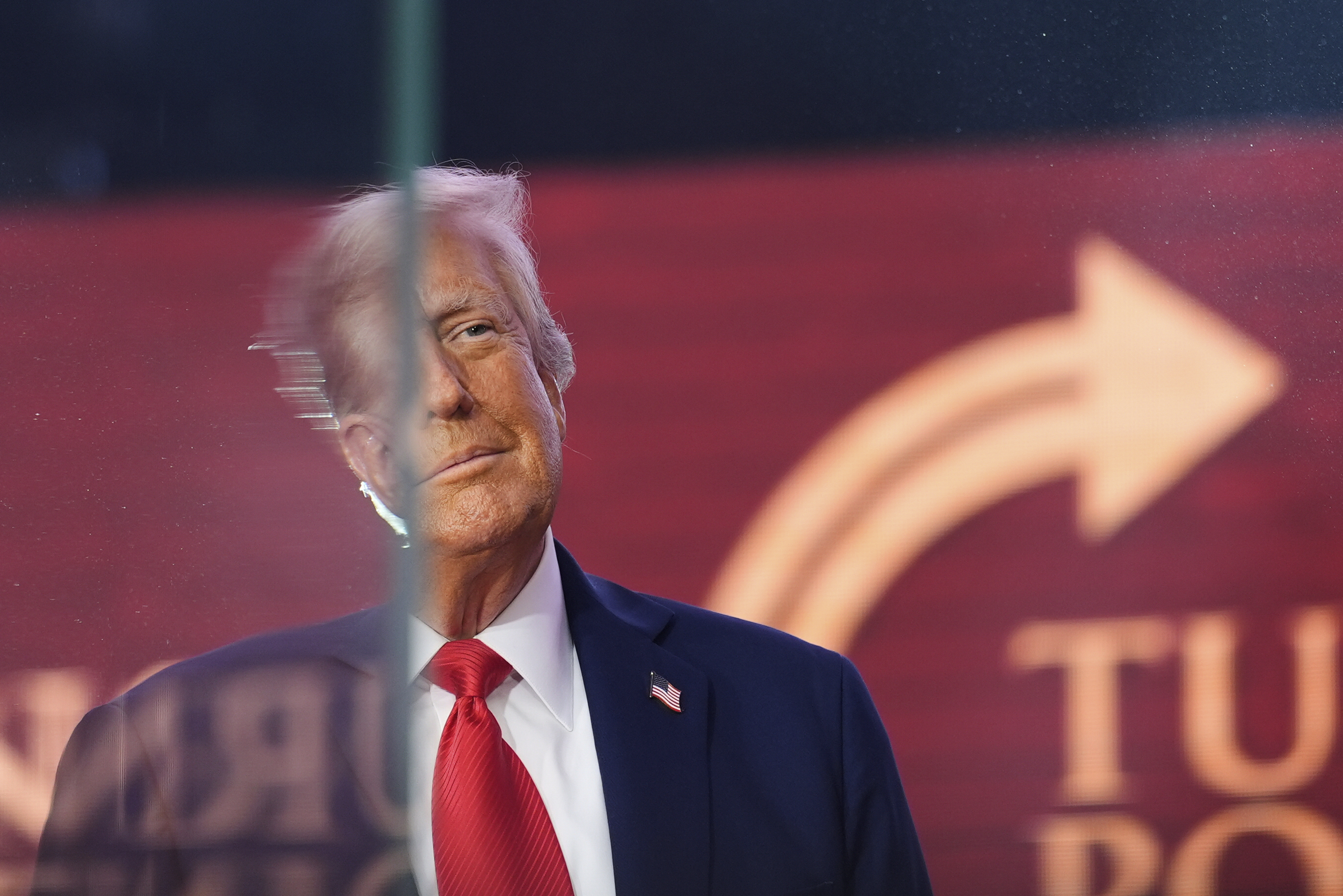 President Donald Trump arrives to speak at a memorial for conservative activist Charlie Kirk, Sunday, Sept. 21, 2025, at State Farm Stadium in Glendale, Ariz. (Julia Demaree Nikhinson - AP)