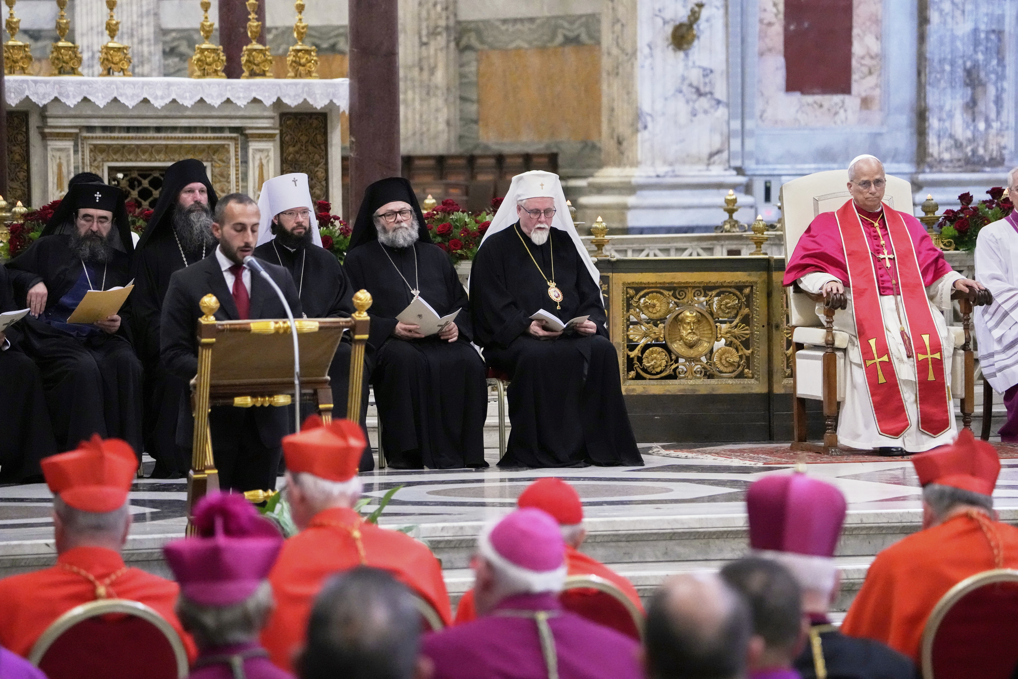 Pope Leo XIV, right, presides over a commemoration of the martyrs and witnesses of the faith of the 21st century with representatives of other churches and Christian communions in the Basilica of St. Paul Outside the Walls in Rome, Sunday, Sept. 14, 2025. (Gregorio Borgia - AP)