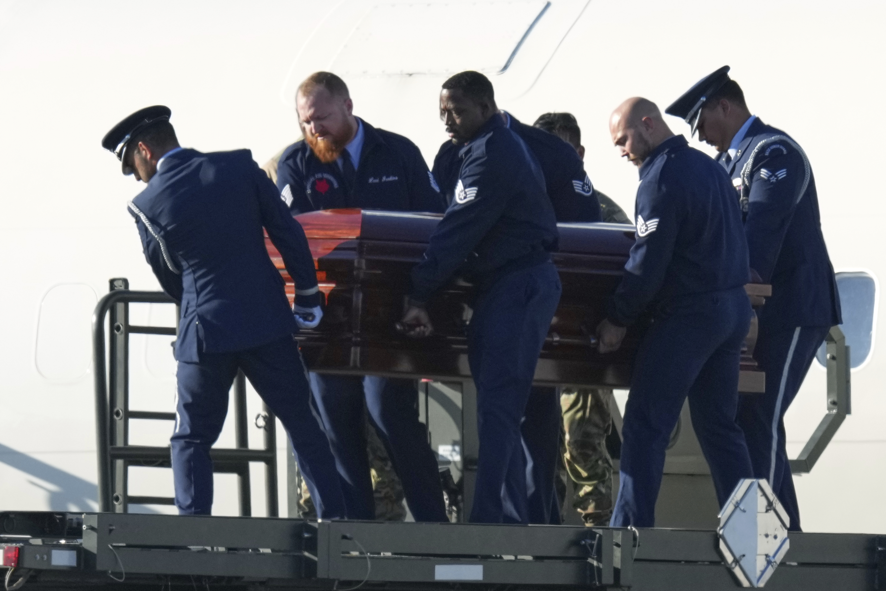 The casket containing the body of Charlie Kirk, the CEO and co-founder of Turning Point USA who was shot and killed on Wednesday is removed from Air Force Two at Phoenix Sky Harbor International Airport, Thursday, Sept. 11, 2025, in Phoenix. (Ross D. Franklin - AP)