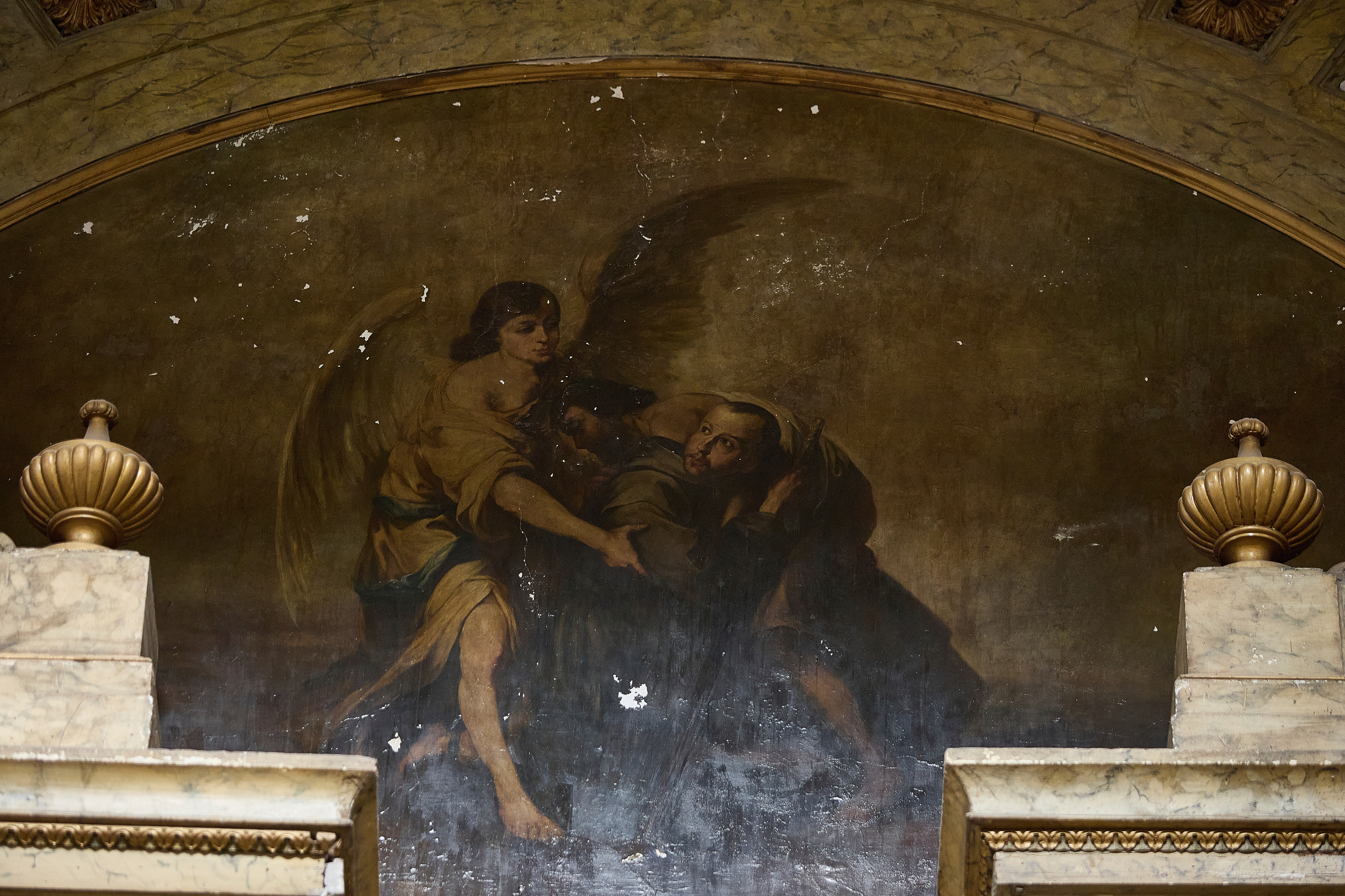 A painting on the altar inside San Juan de Dios church shows repairs due to cracks caused by an earthquake, in Mexico City, Friday, Sept. 19, 2025. The church withstood the 8.0 earthquake of 1985, however, its structure was severely damaged in 2017 and it was forced to shut down and reopened in late 2024 after most of its restoration was completed. (Ginnette Riquelme - AP)