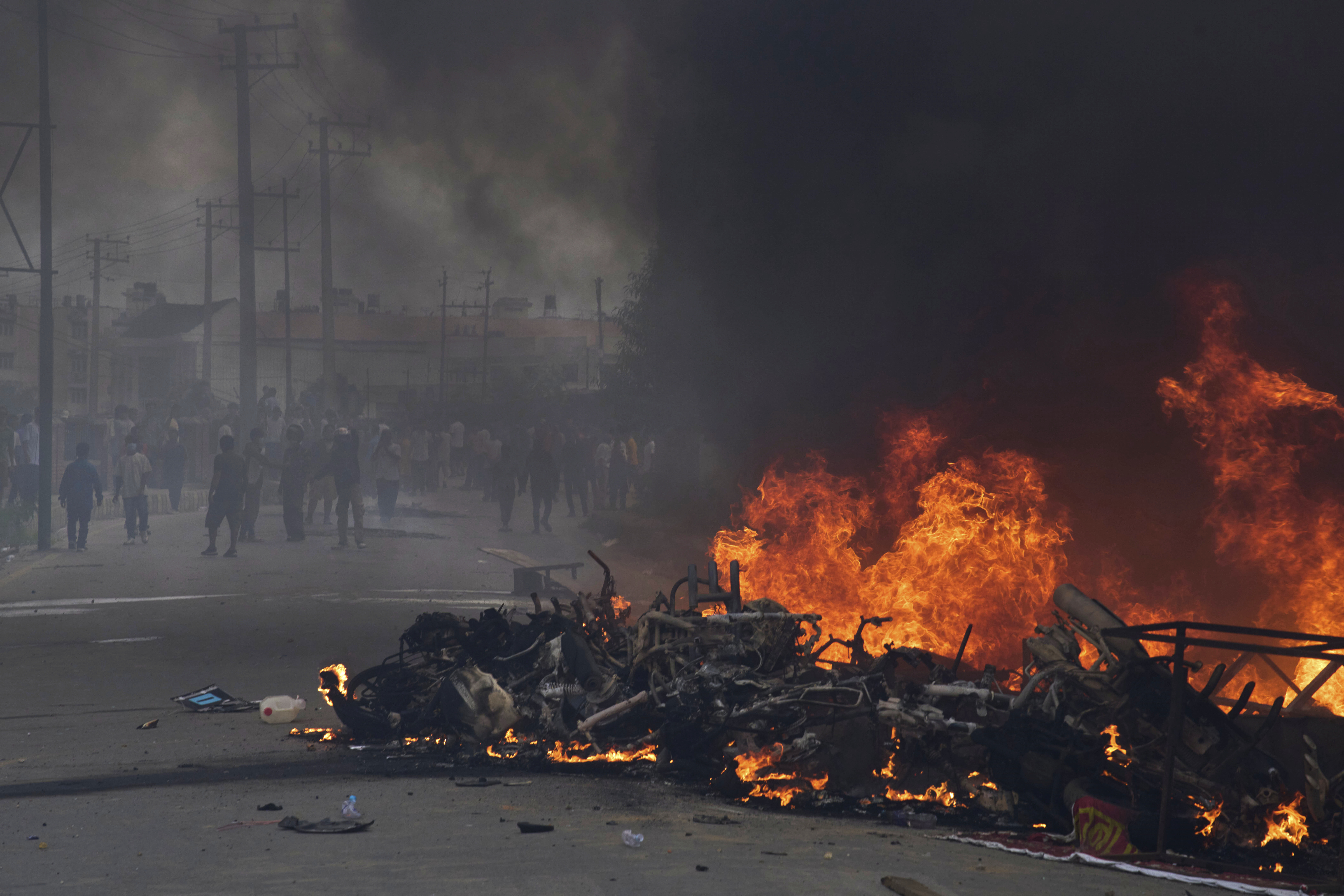 Protesters burn vehicles and tires during protests against social media ban and corruption in Kathmandu, Nepal, Tuesday, Sept. 9, 2025. (Niranjan Shrestha - AP)