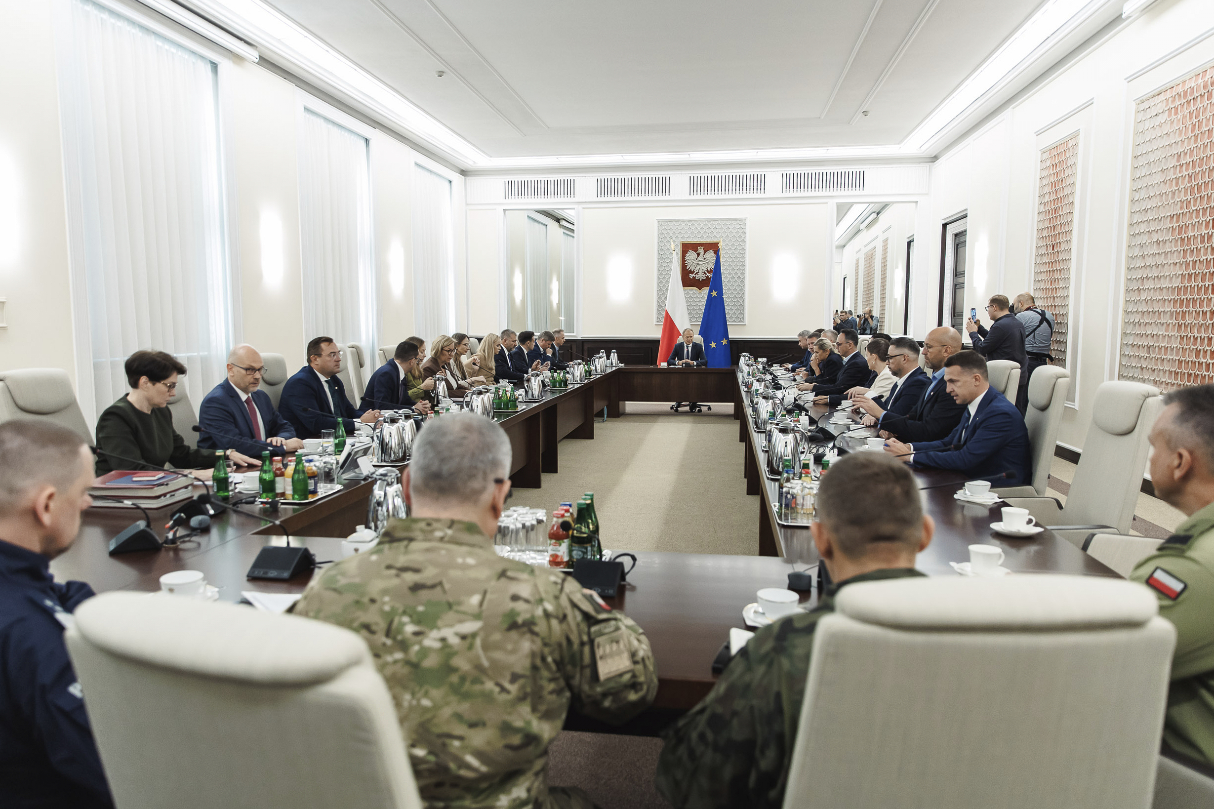Polish Prime Minister Donald Tusk holds an extraordinary government meeting at the chancellery, with military and emergency services officials, following violations of Polish airspace during a Russian attack, in Warsaw, Poland, Wednesday, Sept. 10, 2025. (Chancellery of the Prime Minister of Poland - AP)