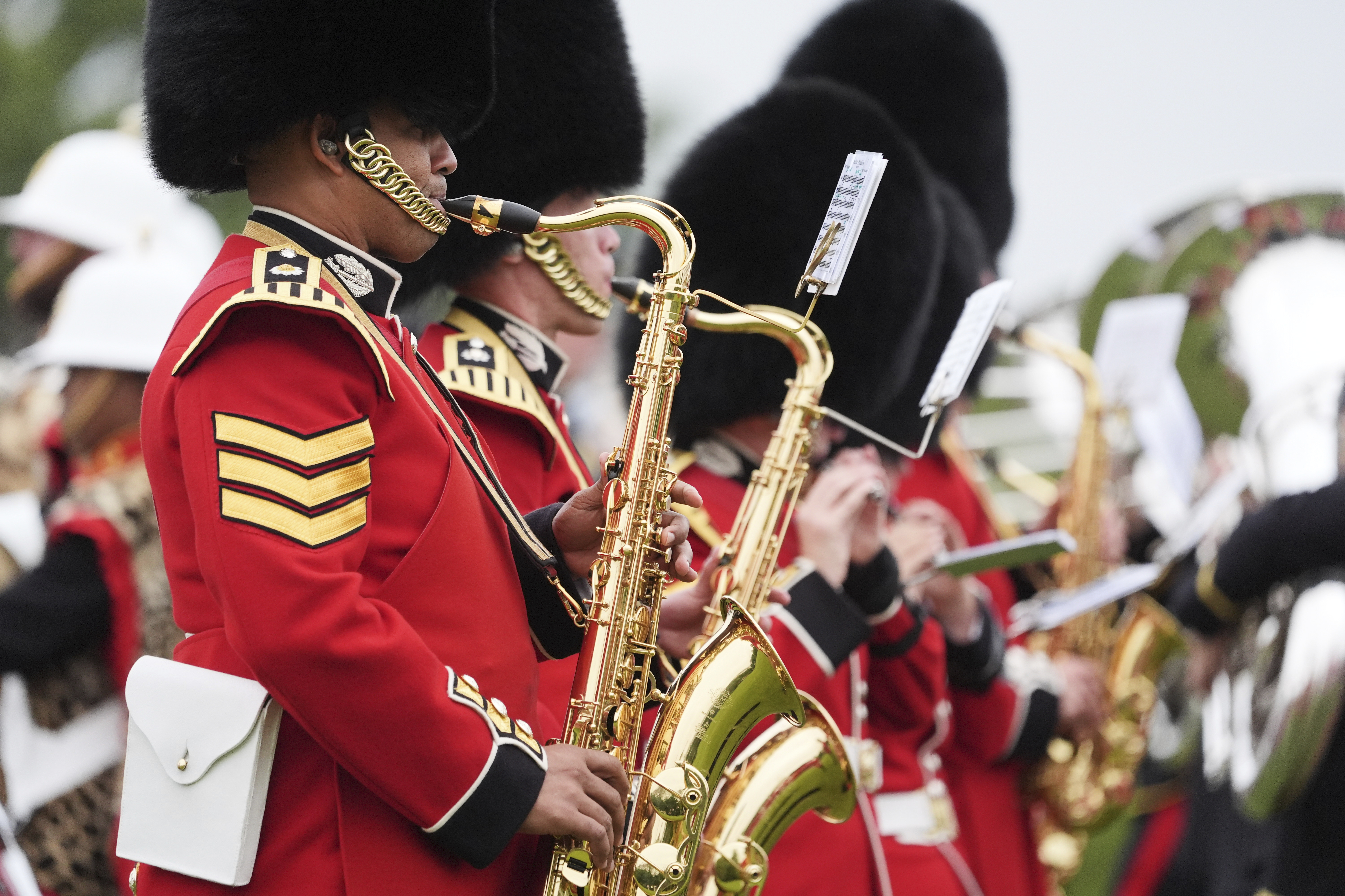 Musicians play during a Beating Retreat musical performance on the East Lawn of Windsor Castle, in Windsor, England, Wednesday, Sept. 17, 2025. (Evan Vucci - AP)