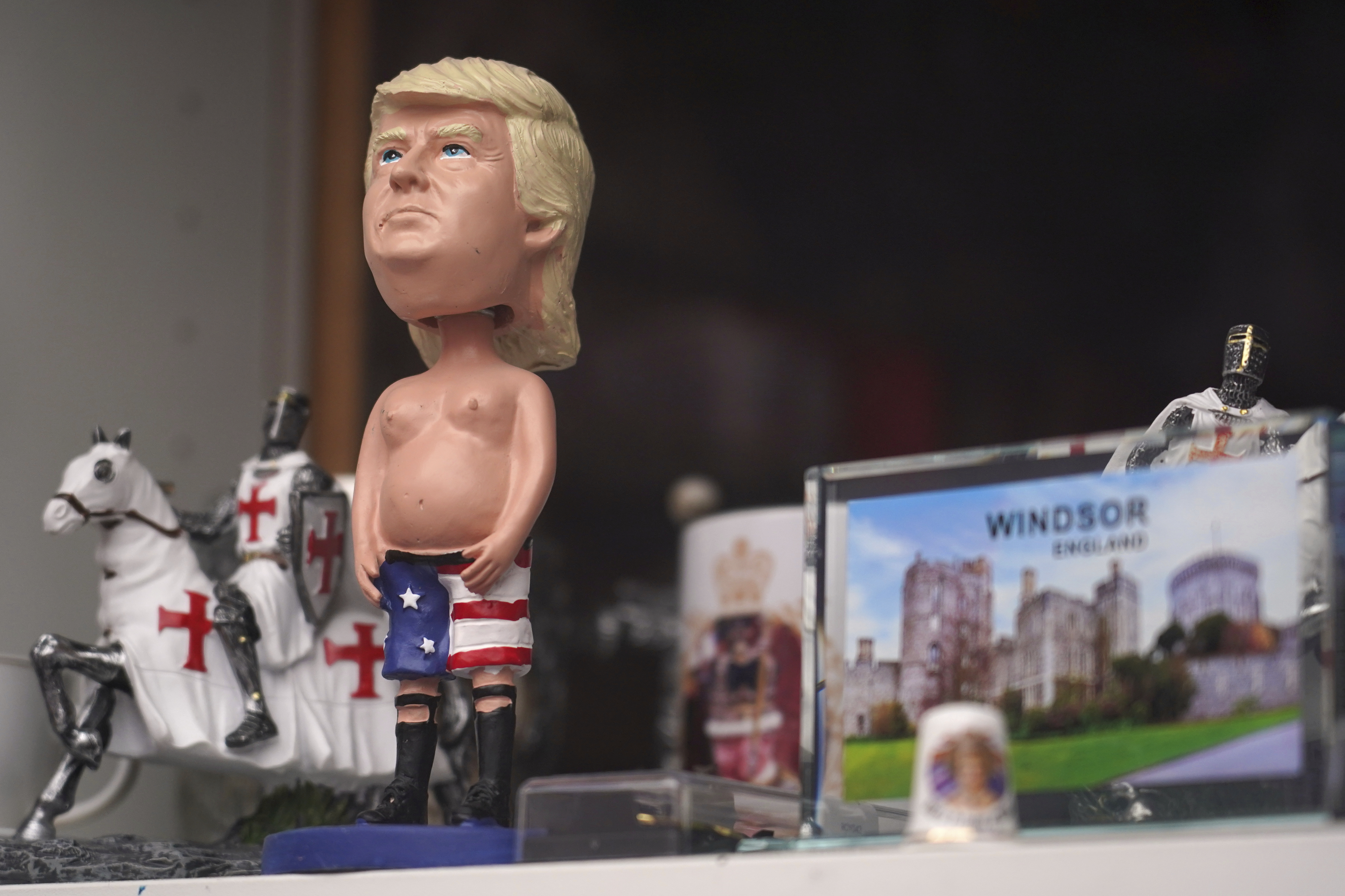 Royal and President Donald Trump themed merchandising products stand in a shop window in Windsor, England, Wednesday, Sept. 17, 2025. (Alberto Pezzali - AP)