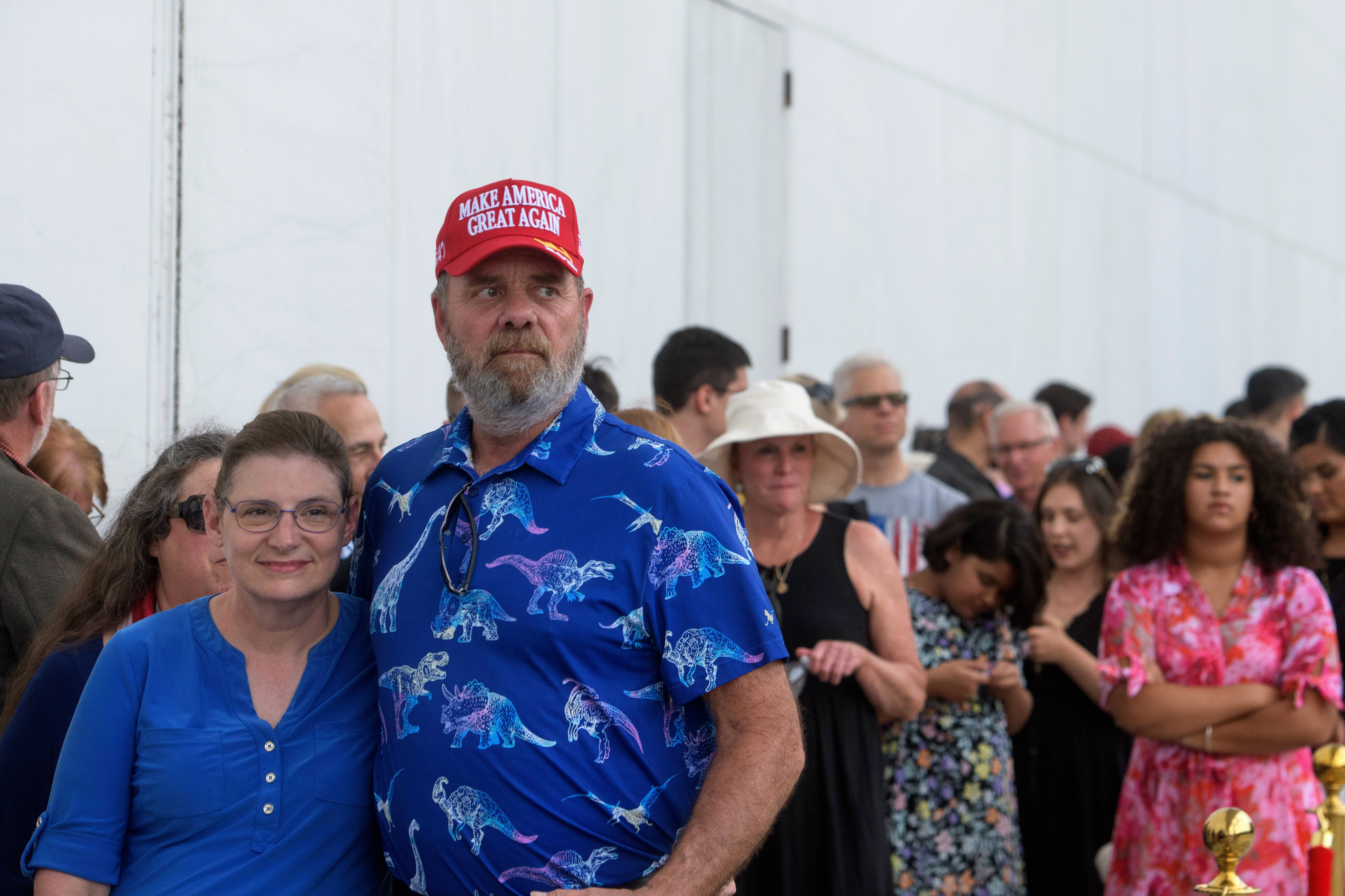 Kevin Vanriper, right, and his wife Barbara Vanriper, left, of Sarasota, Fla., join other people waiting in line for a memorial and prayer vigil for Charlie Kirk at the John F. Kennedy Memorial Center for the Performing Arts, Sunday, Sept. 14, 2025, in Washington. (Rod Lamkey - FR172078)