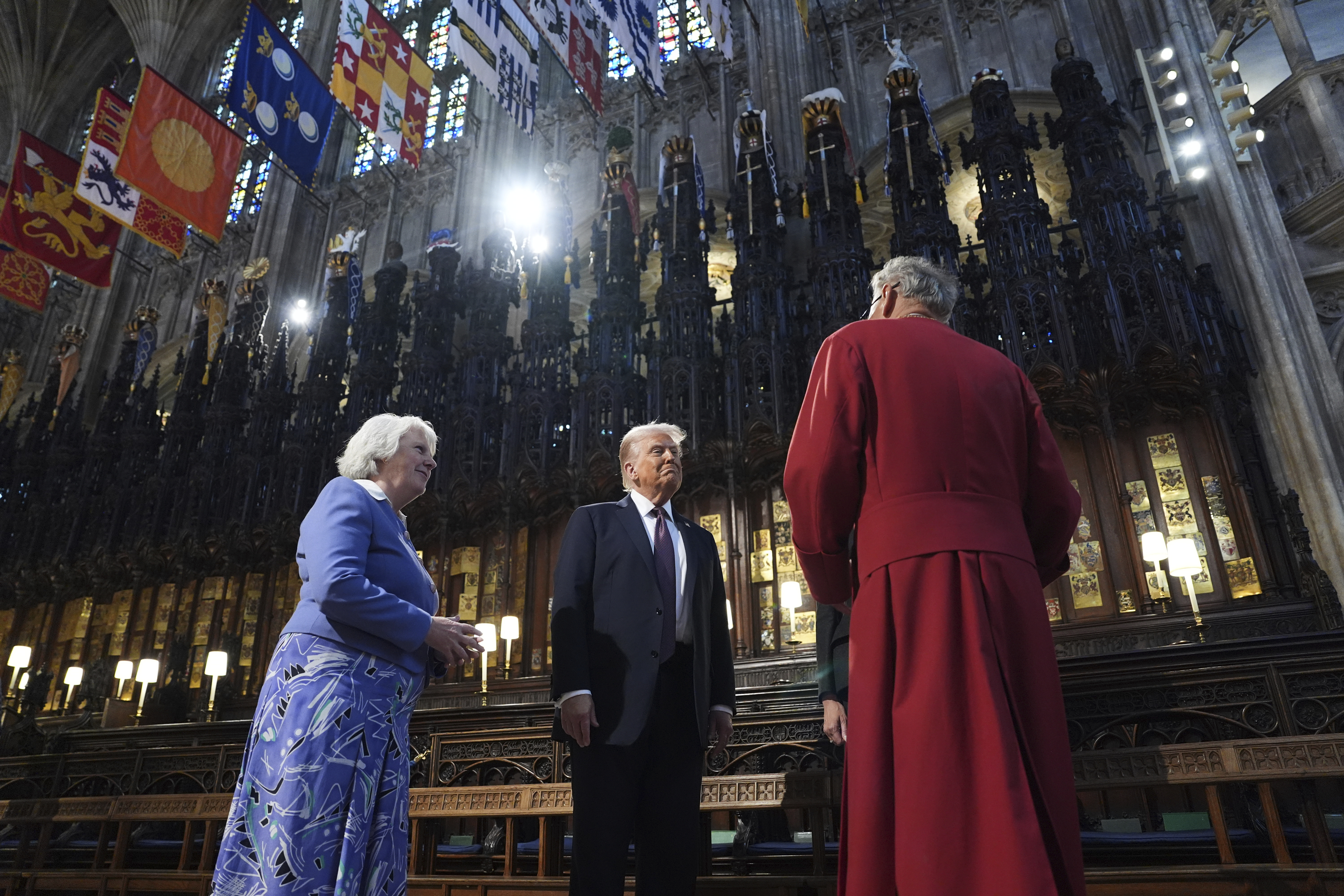 President Donald Trump and first lady Melania Trump receive a tour of St. George's Chapel at Windsor Castle, Windsor, England, Wednesday, Sept. 17, 2025. (Evan Vucci - Pool AP)