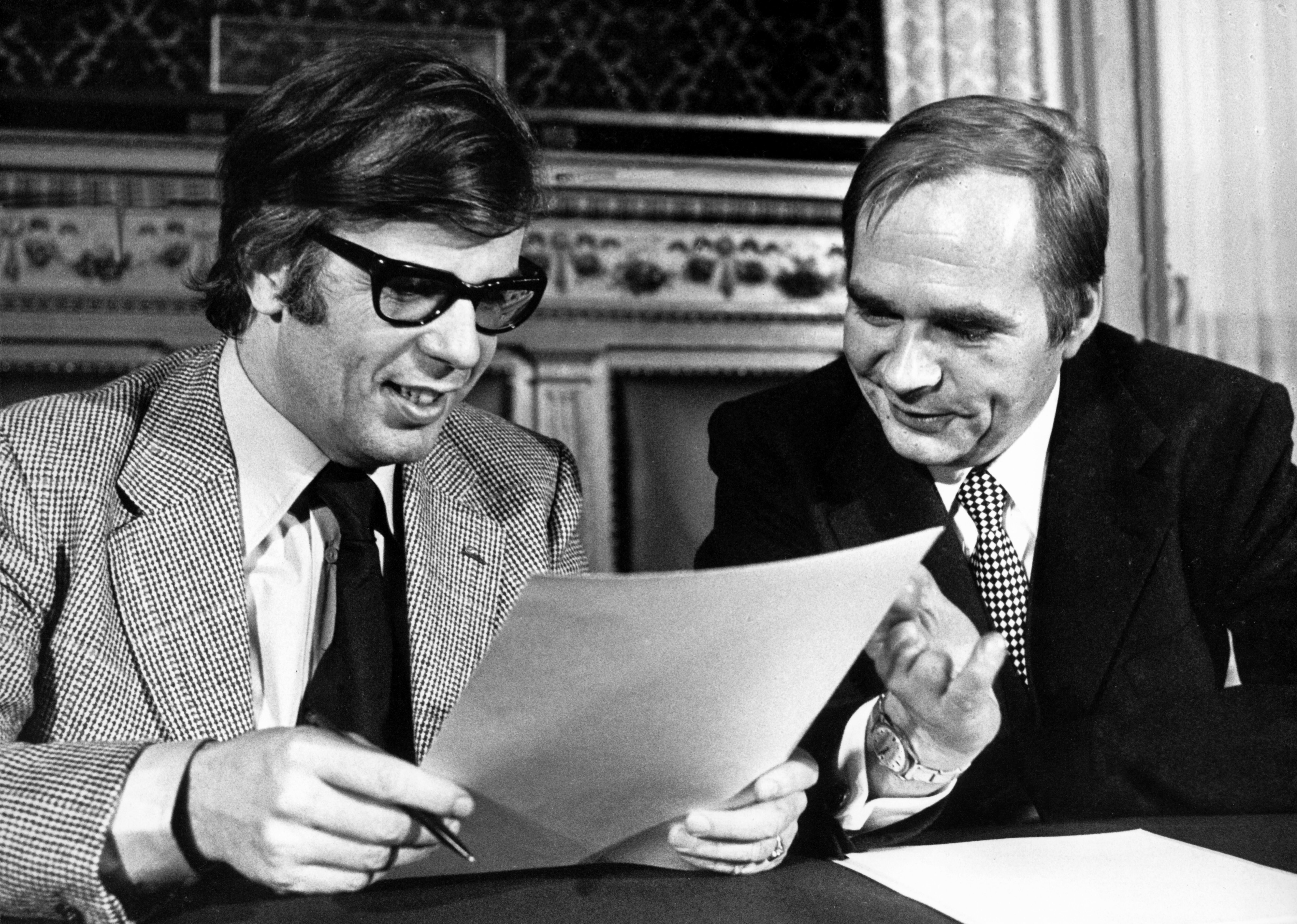 FILE - The future director of the Hamburg State Opera, Christoph von Dohnanyi, left, and the then Hamburg Senator for Culture Dieter Biallas, in Hamburg City Hall after signing the contract, in Hamburg, Germany, Dec. 4, 1974. (Werner Baum - DPA)