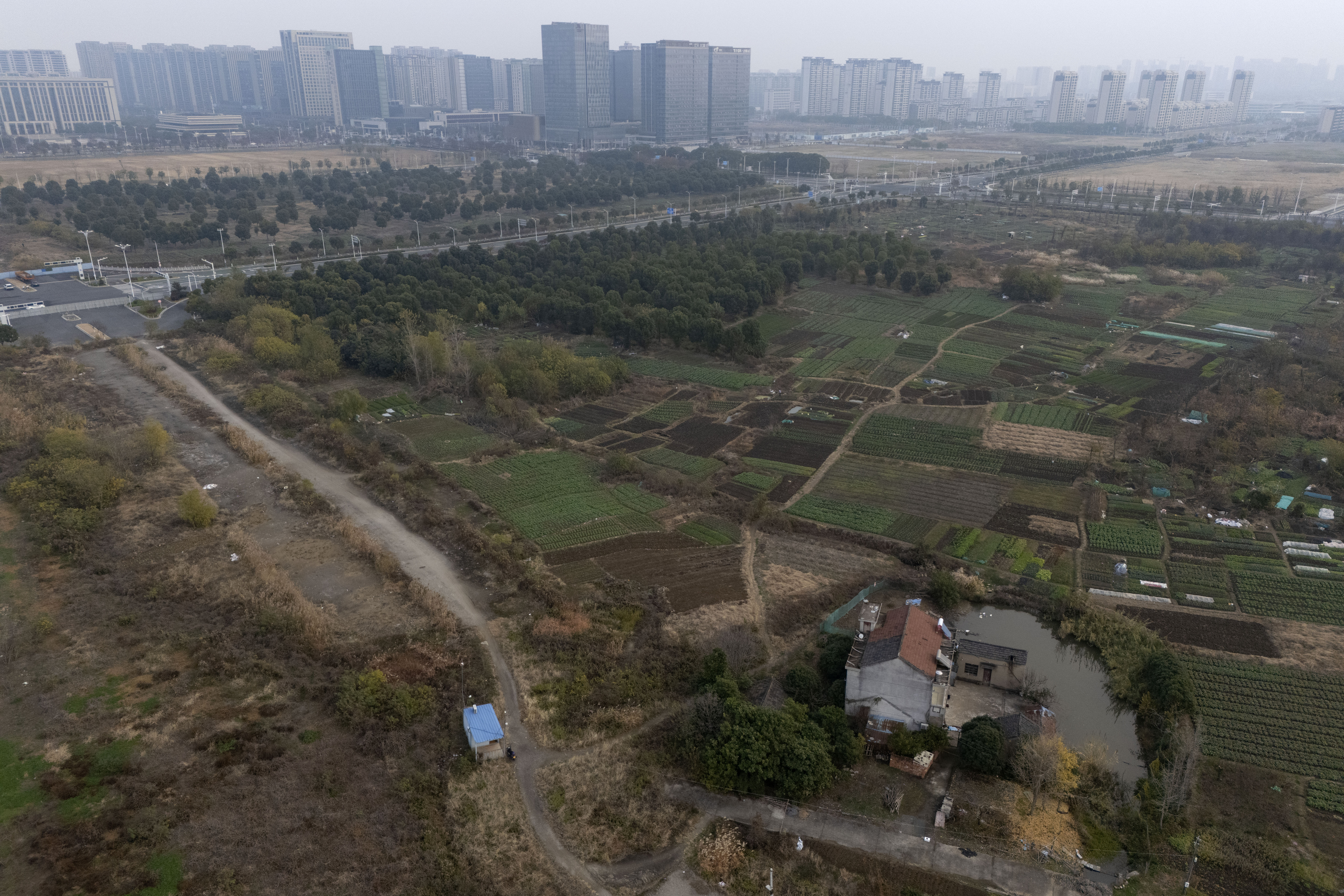A blue roof hut fitted with police surveillance cameras and lights are seen near the home of petitioner Yang Guoliang in Changzhou in eastern China's Jiangsu Province, Friday, Dec. 13, 2024. (Ng Han Guan - AP)