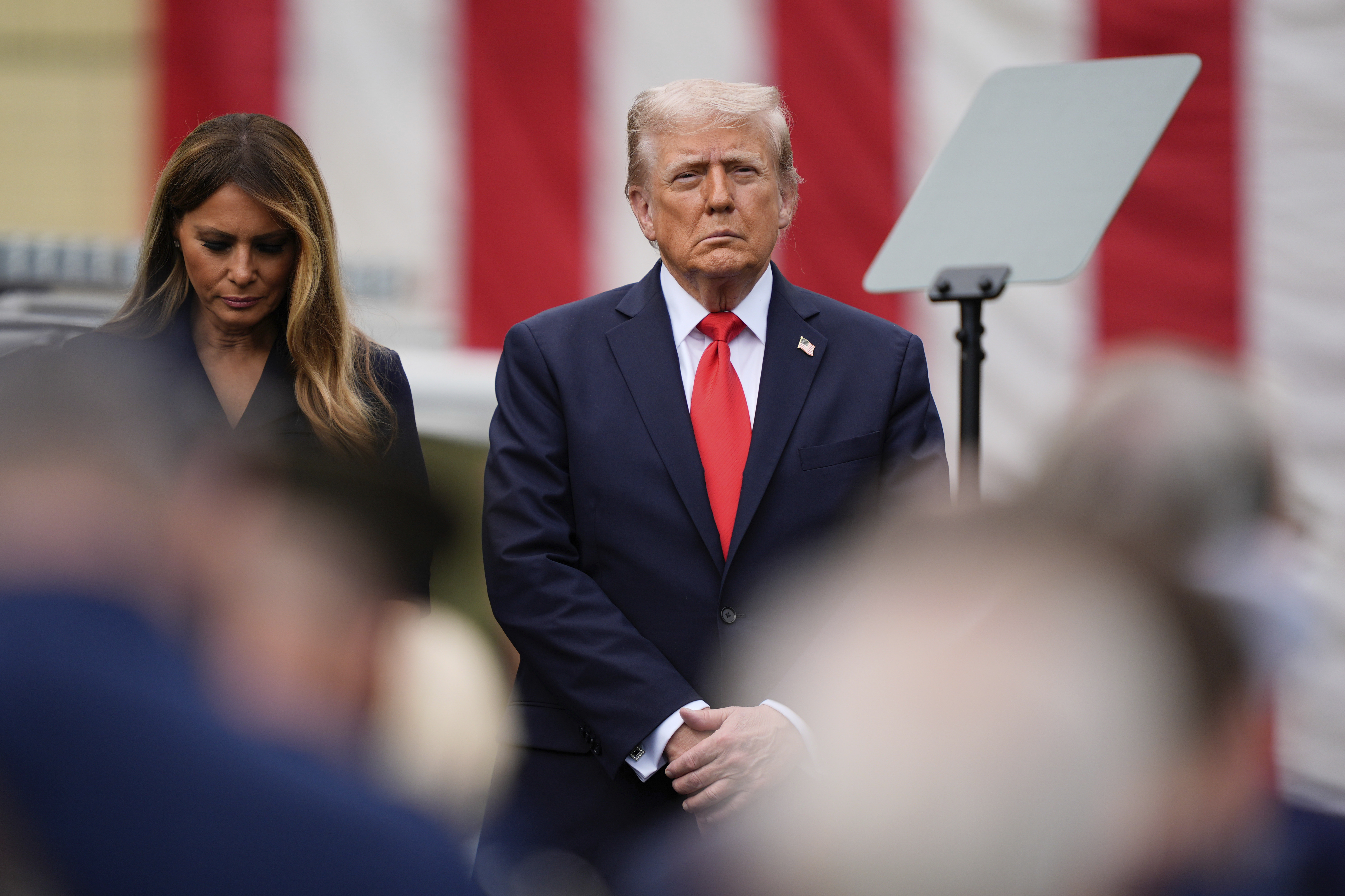 President Donald Trump, right, and first lady Melania Trump attend a ceremony in the Pentagon courtyard to commemorate the 24th anniversary of the 9/11 attacks, Thursday, Sept. 11, 2025, in Washington. (Julia Demaree Nikhinson - AP)