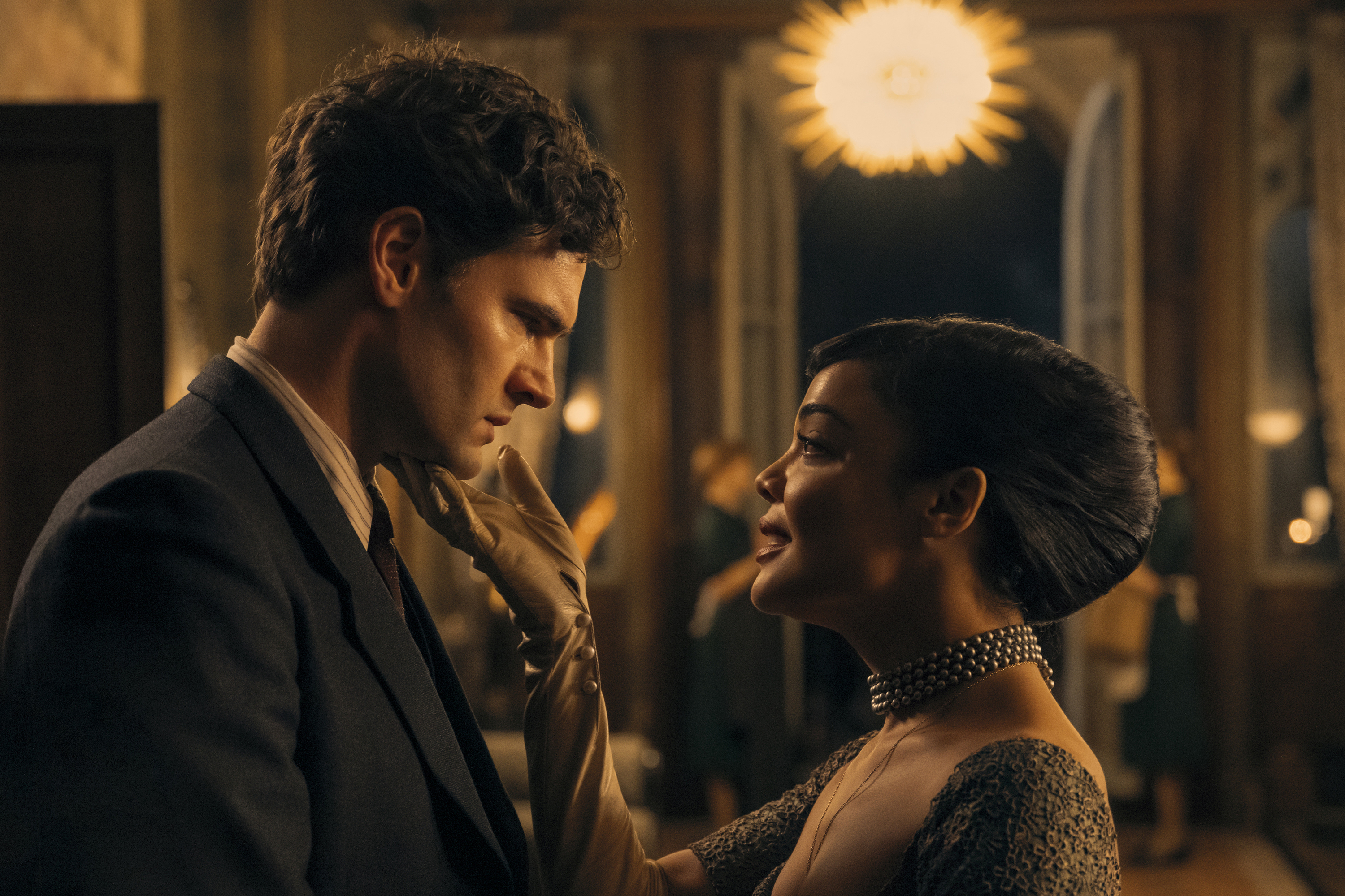 This image released by Amazon Prime shows Tom Bateman, left, and Tessa Thompson in a scene from 