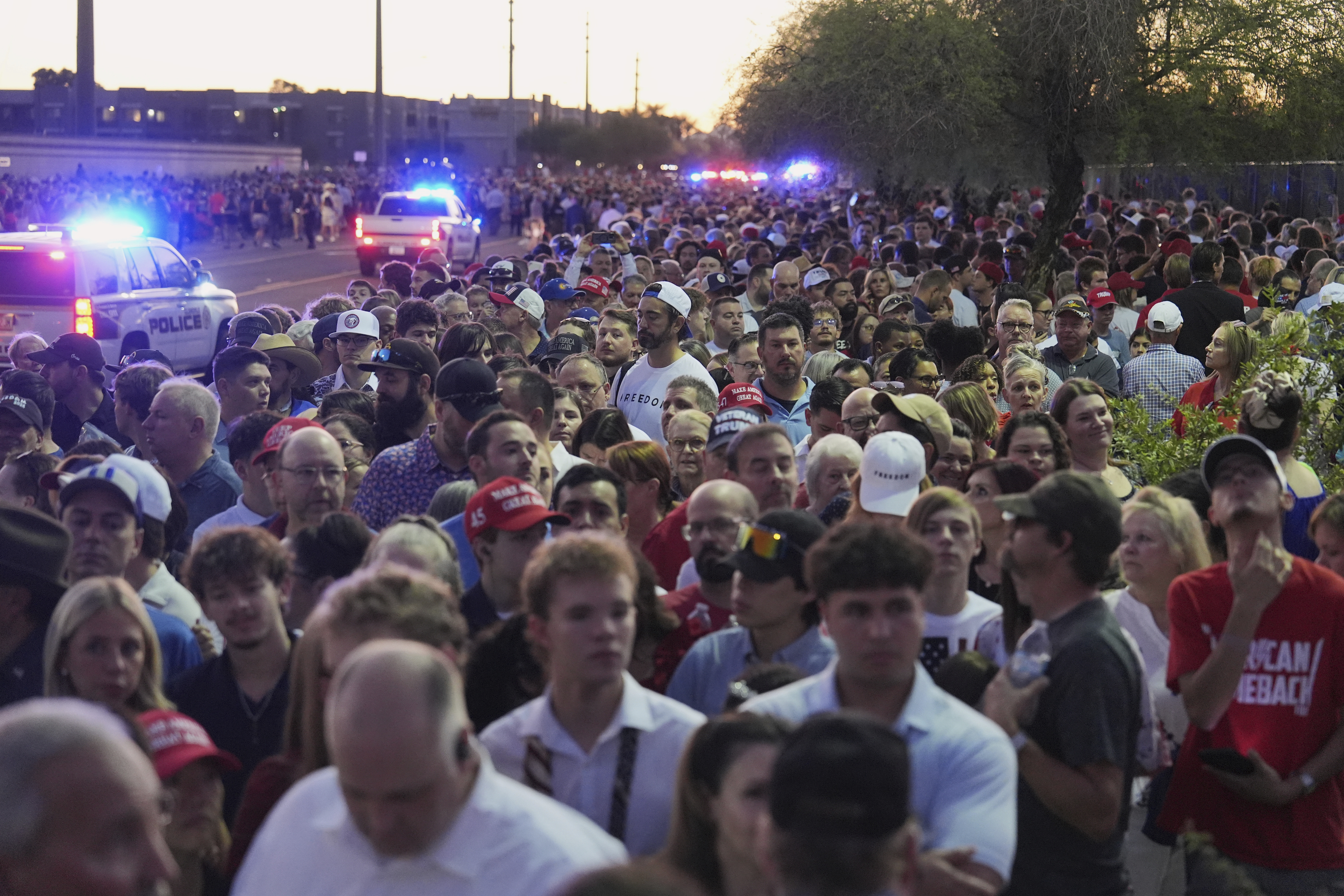 People wait in line before a memorial for conservative activist Charlie Kirk Sunday, Sept. 21, 2025, at State Farm Stadium in Glendale, Ariz. (Jae C. Hong - AP)