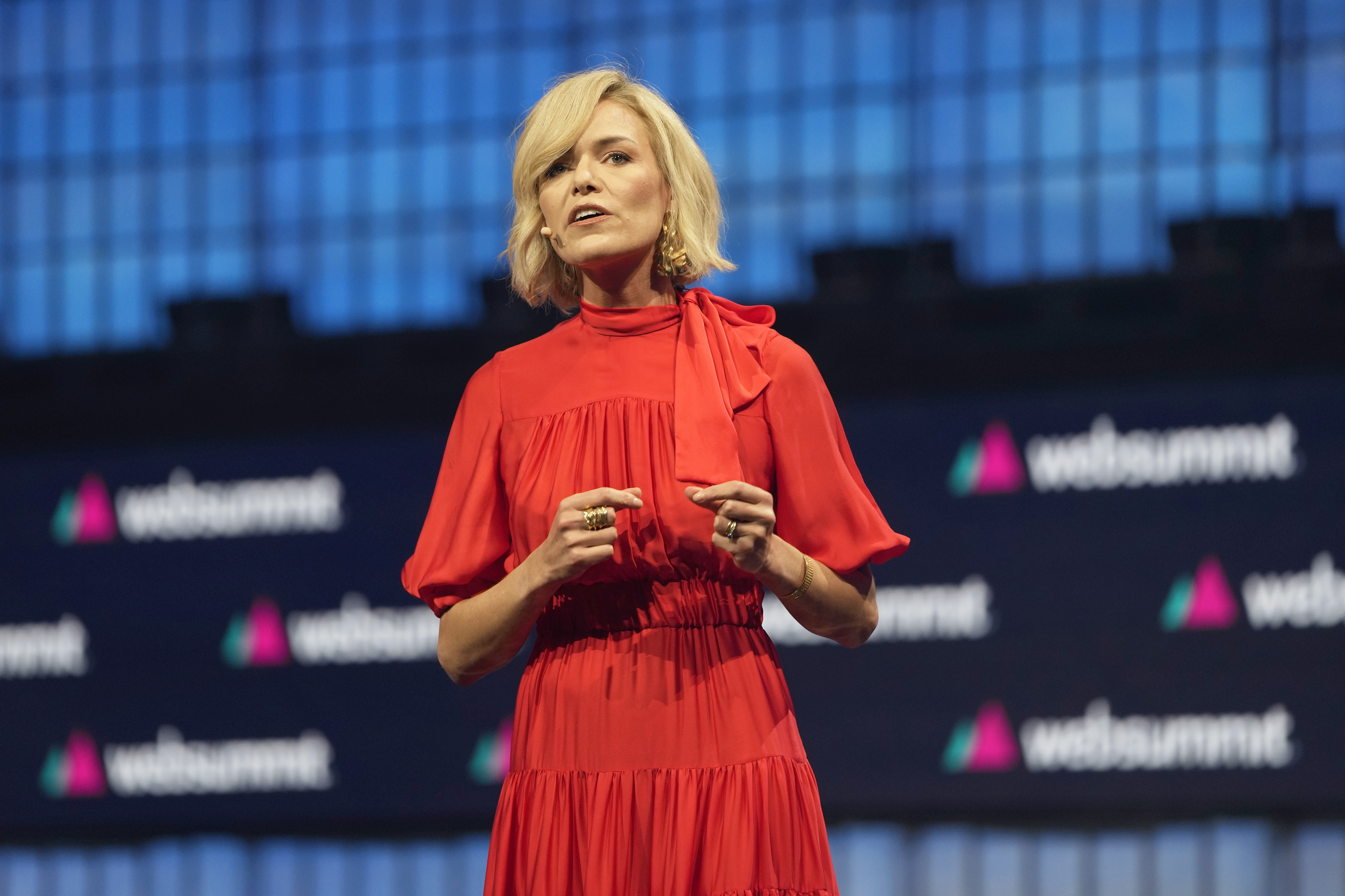 FILE - Katherine Maher gestures during a speech opening the technology conference, in Lisbon, Nov. 13, 2023. (Armando Franca - AP)