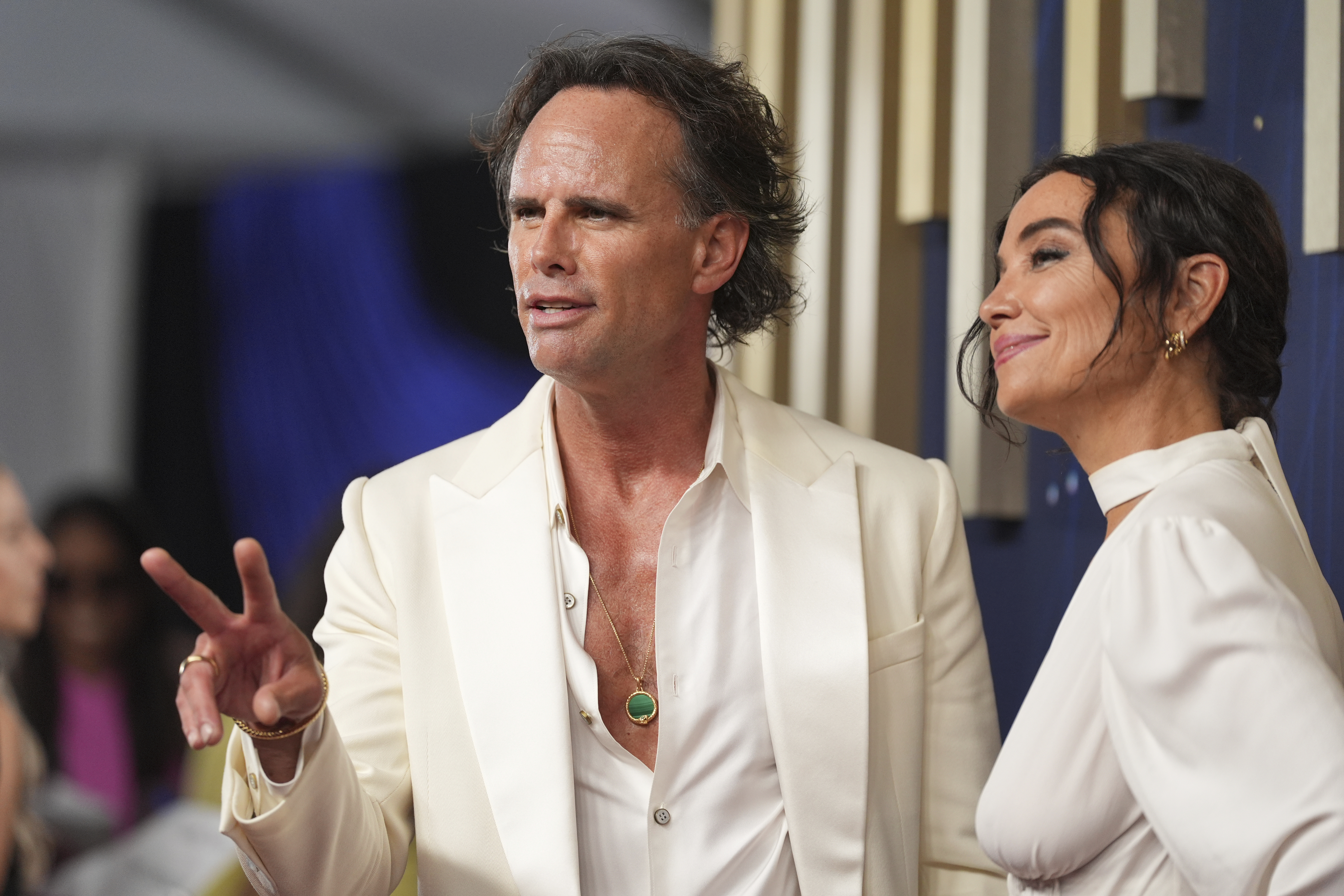 Walton Goggins, left, and Nadia Conners arrive at the 77th Primetime Emmy Awards on Sunday, Sept. 14, 2025, at the Peacock Theater in Los Angeles. (Jae C. Hong - Invision)