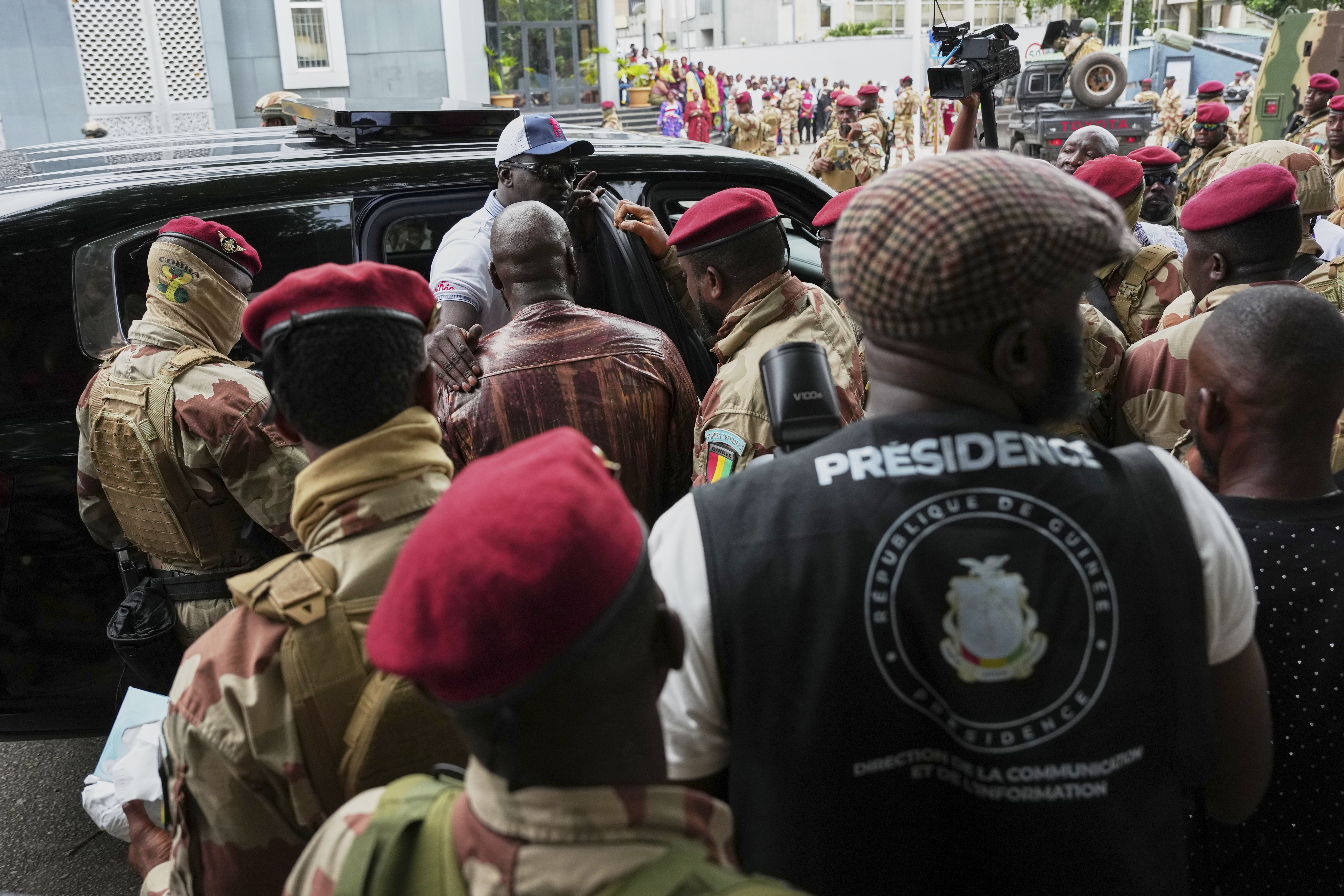 Guinea's interim President, Gen. Mamadi Doumbouya, departs after casting his vote in the constitutional referendum, in Conakry, Guinea, Sunday, Sept. 21, 2025. (Misper Apawu - AP)