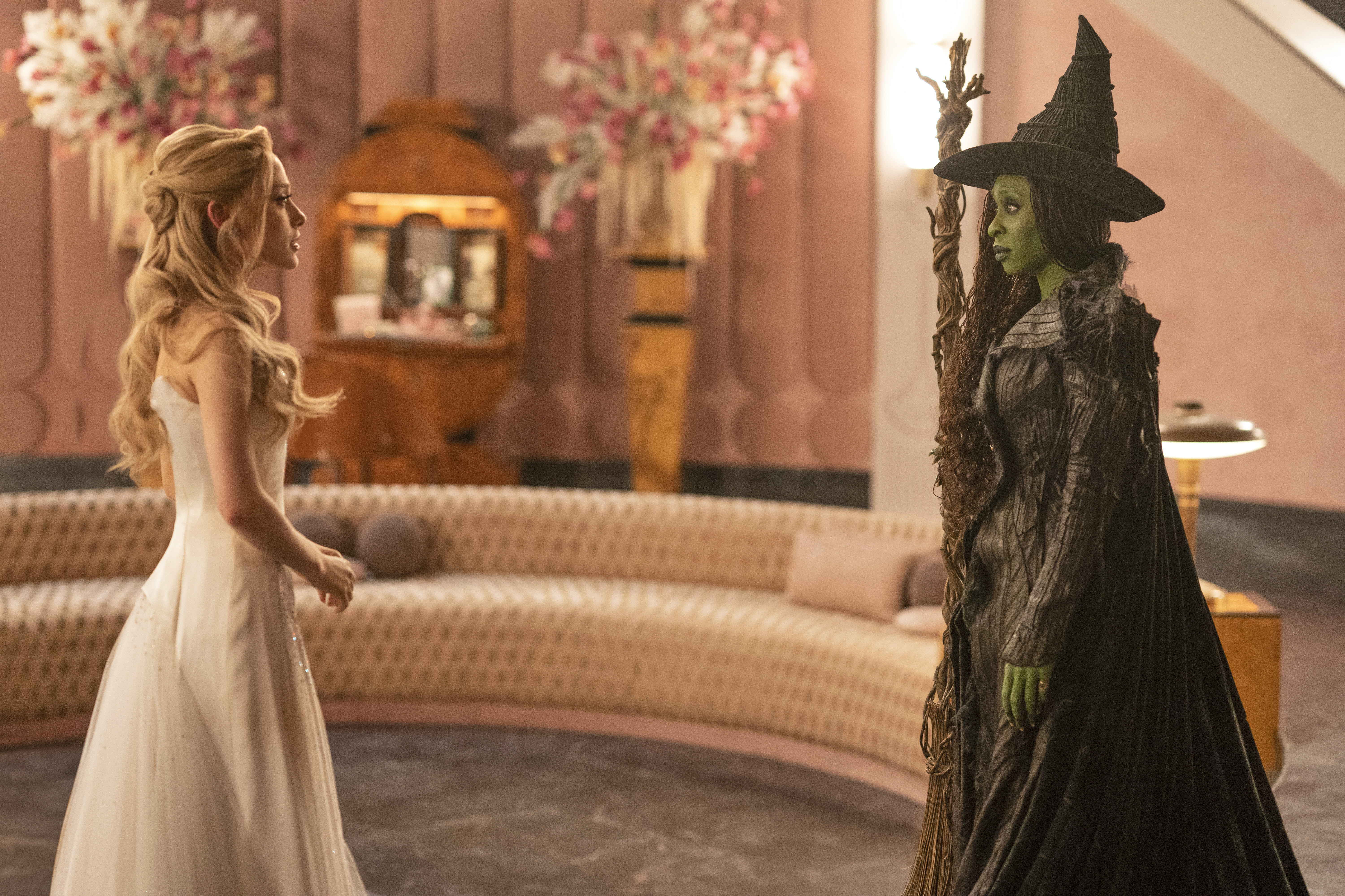 This image released by Universal Pictures shows Ariana Grande, left, and Cynthia Erivo in a scene from 