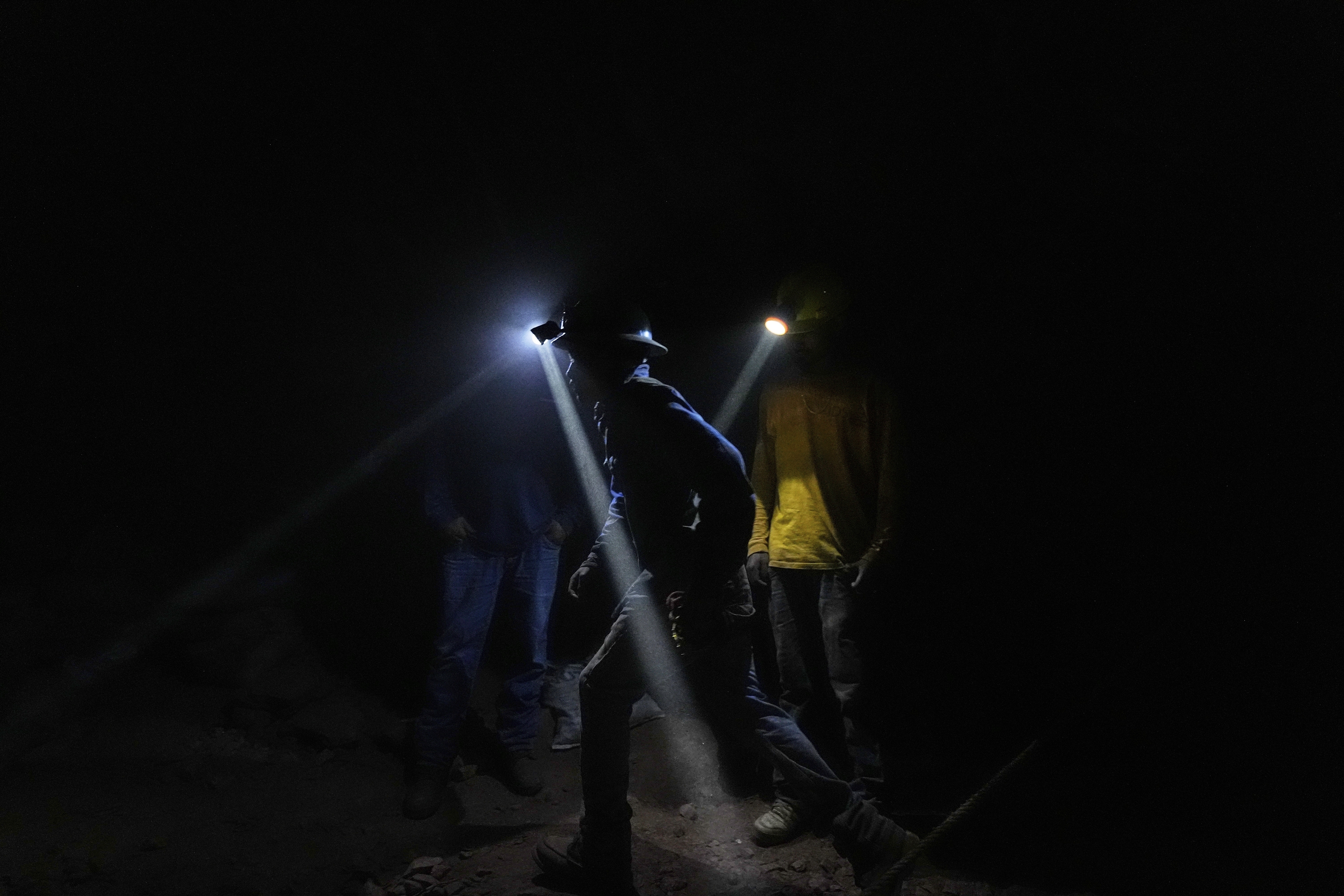 A worker emerges from one of the caverns while mining mercury in San Joaquin, Mexico, Tuesday, Aug. 19, 2025. (Fernando Llano - AP)