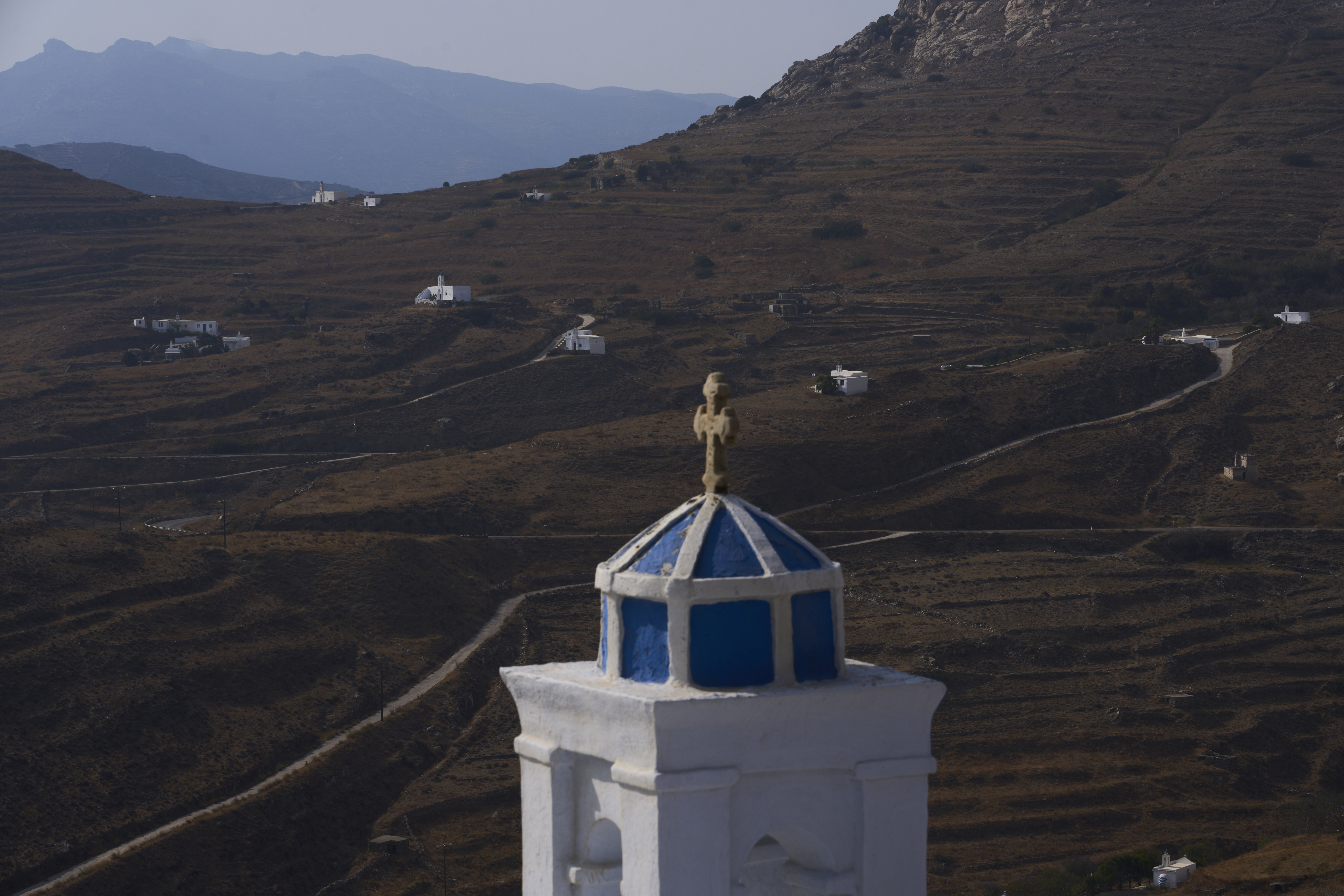 Family-owned chapels stand on the Aegean Sea island of Tinos, Greece, Sunday, Sept. 7, 2025. (Petros Giannakouris - AP)