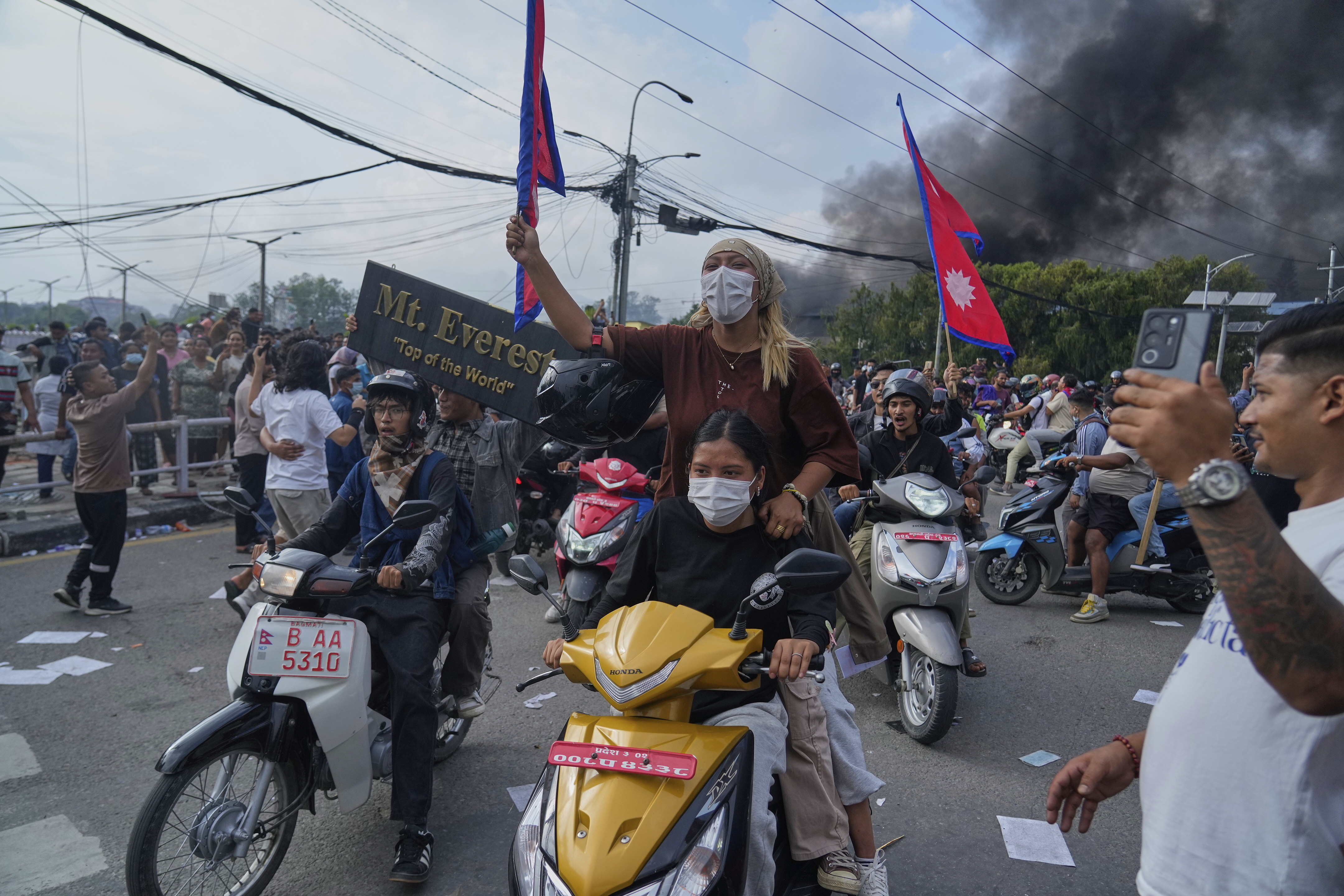 Protesters shout slogans during a protest against a social media ban and corruption in Kathmandu, Nepal, Tuesday, Sept. 9, 2025. (Niranjan Shrestha - AP)