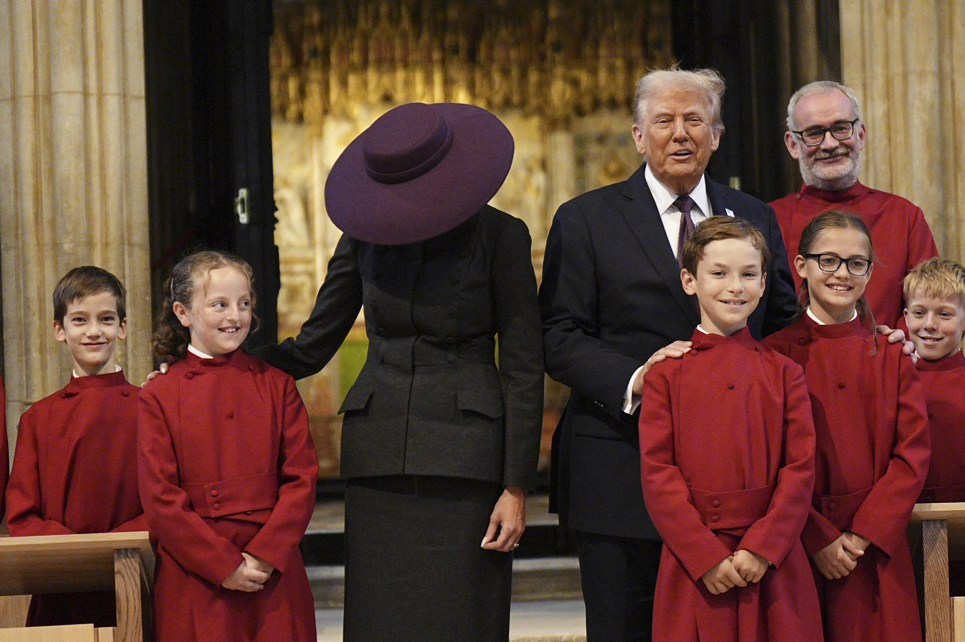 President Donald Trump and first lady Melania Trump attend their visit to St George's Chapel at Windsor Castle, in Windsor, England, Wednesday Sept. 17, 2025. (Aaron Chown - Pool PA)