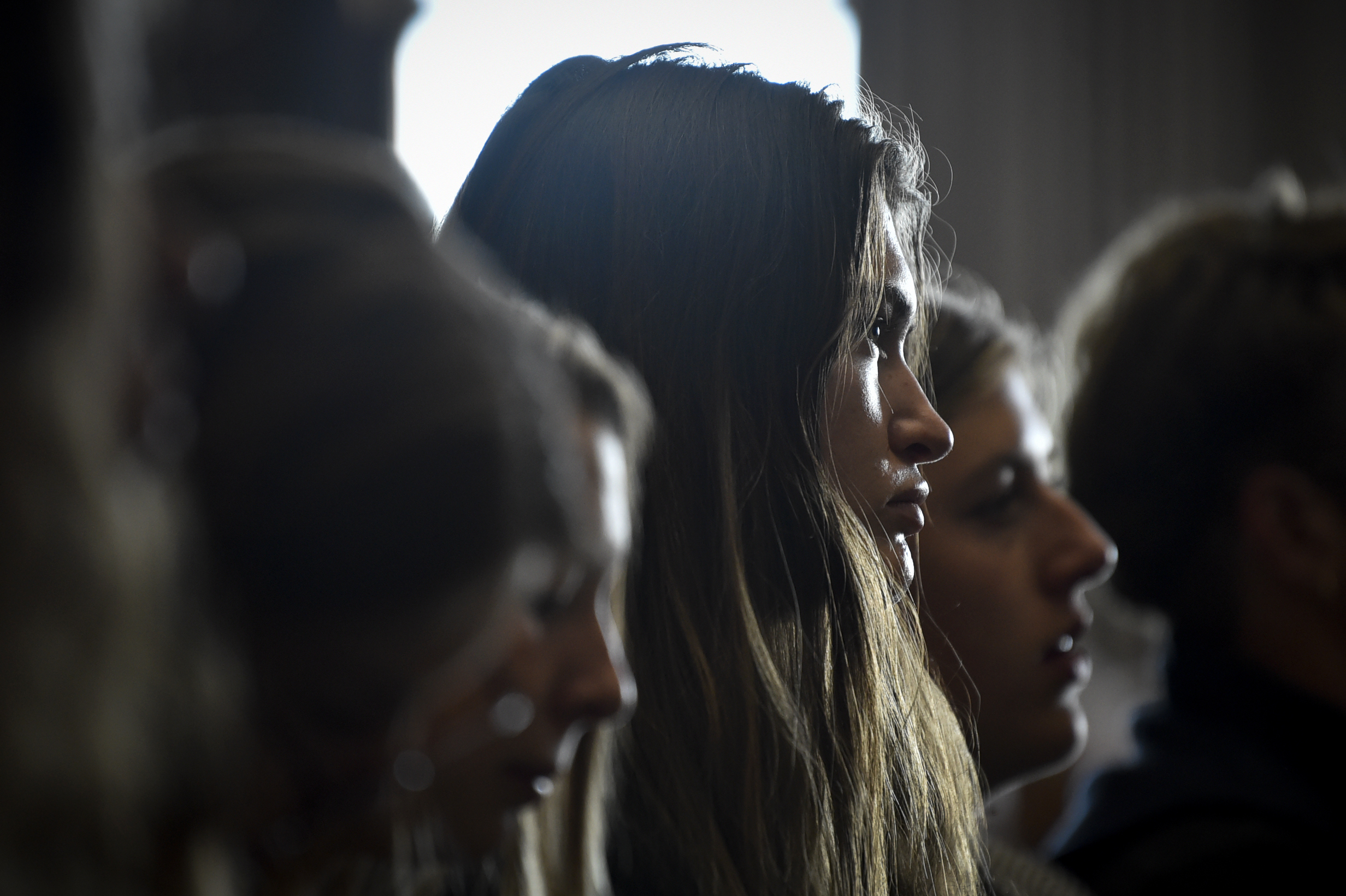 FILE - Lead plaintiff Rikki Held listens to testimony during a hearing in the climate change lawsuit, Held vs. Montana, at the Lewis and Clark County Courthouse on, June 20, 2023, in Helena, Mont. (Thom Bridge - Independent Record)