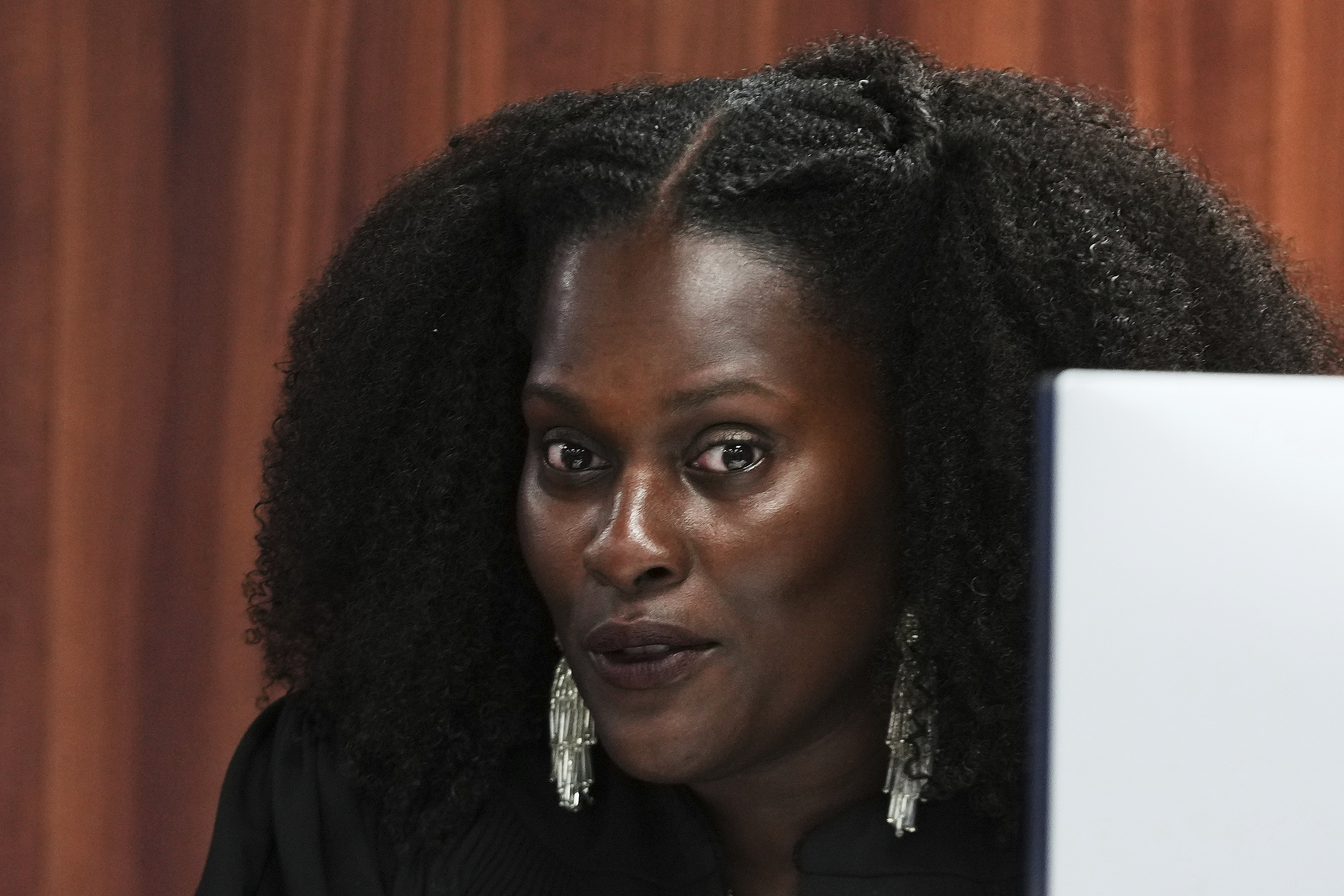 District Court Judge Kristen Simmons speaks while dismissing the criminal cases against 15 people accused of acting falsely as electors for President Donald Trump in the 2020 election Tuesday, Sept. 9, 2025 in Lansing, Mich. (Paul Sancya - AP)