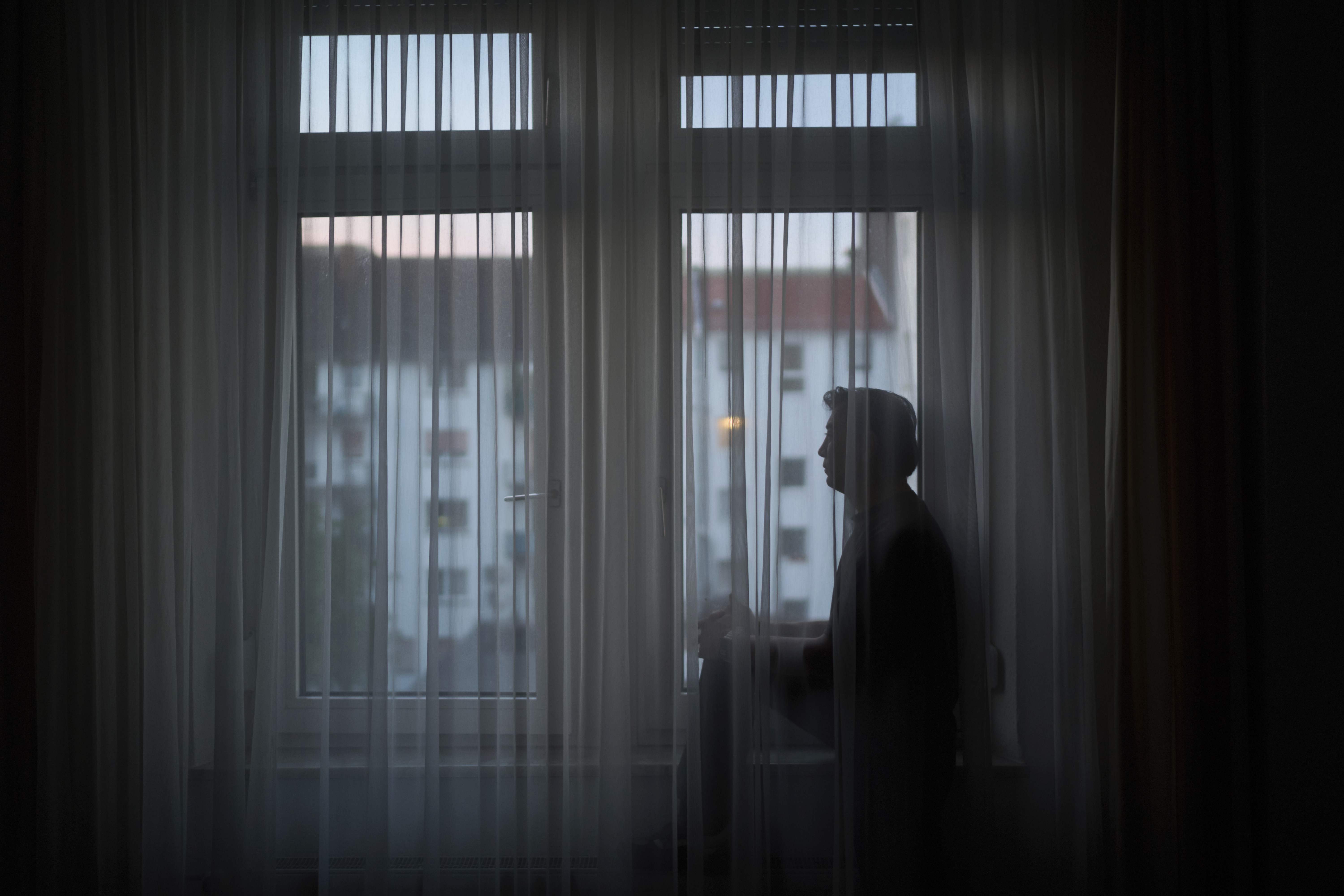 Former Xinjiang government engineer Nureli Abliz, who saw firsthand how surveillance technology flagged thousands of people in China for detention, even when they had committed no crime, sits for a portrait in Mannheim, Germany, Wednesday, July 23, 2025. (David Goldman - AP)
