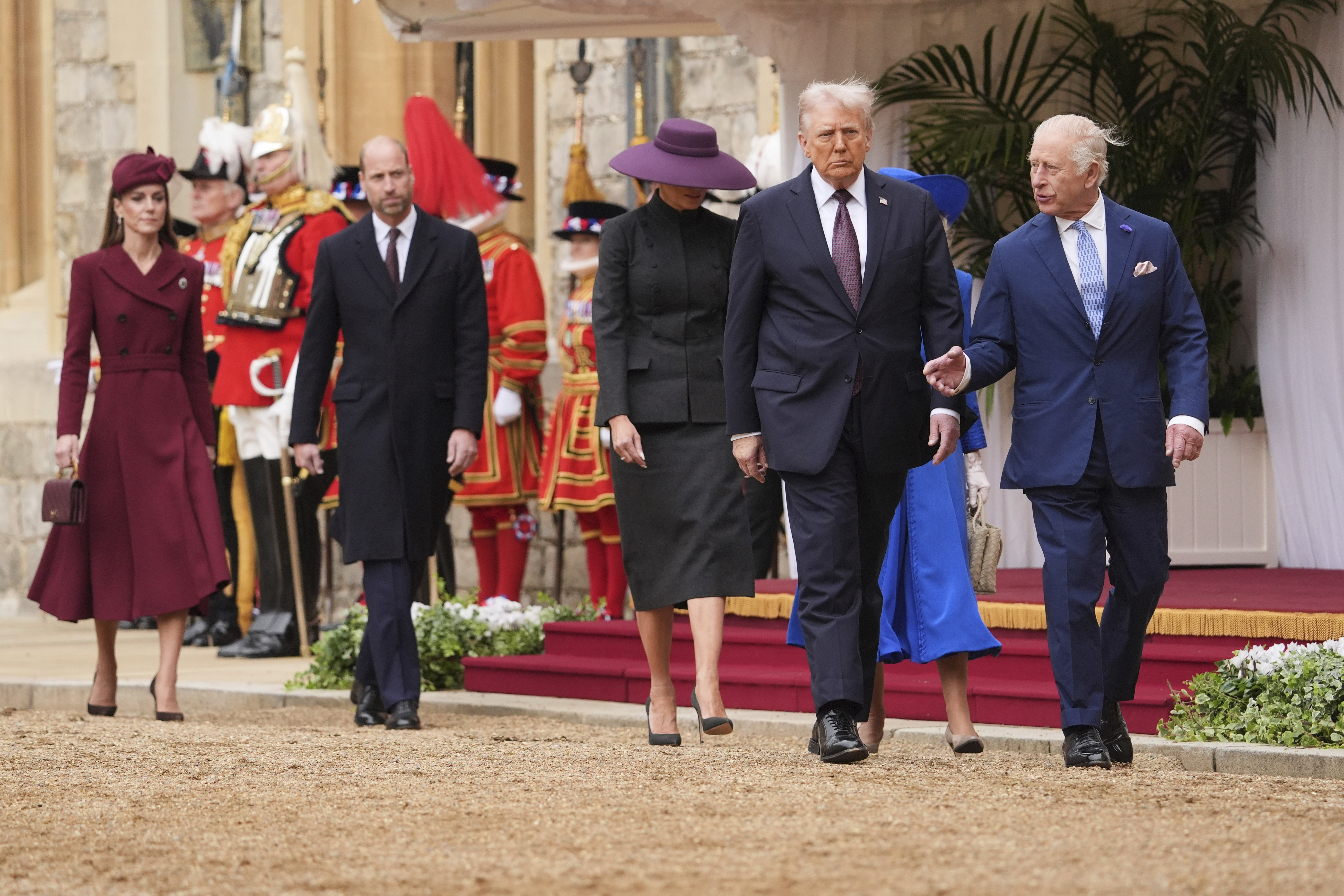 From left, Britain's Kate, Princess of Wales, Britain's Prince William, President Donald Trump and first lady Melania Trump, Britain's King Charles III and Britain's Queen Camilla walk during arrival ceremony at Windsor Castle, in Windsor, England, Wednesday, Sept. 17, 2025. (Evan Vucci - AP)