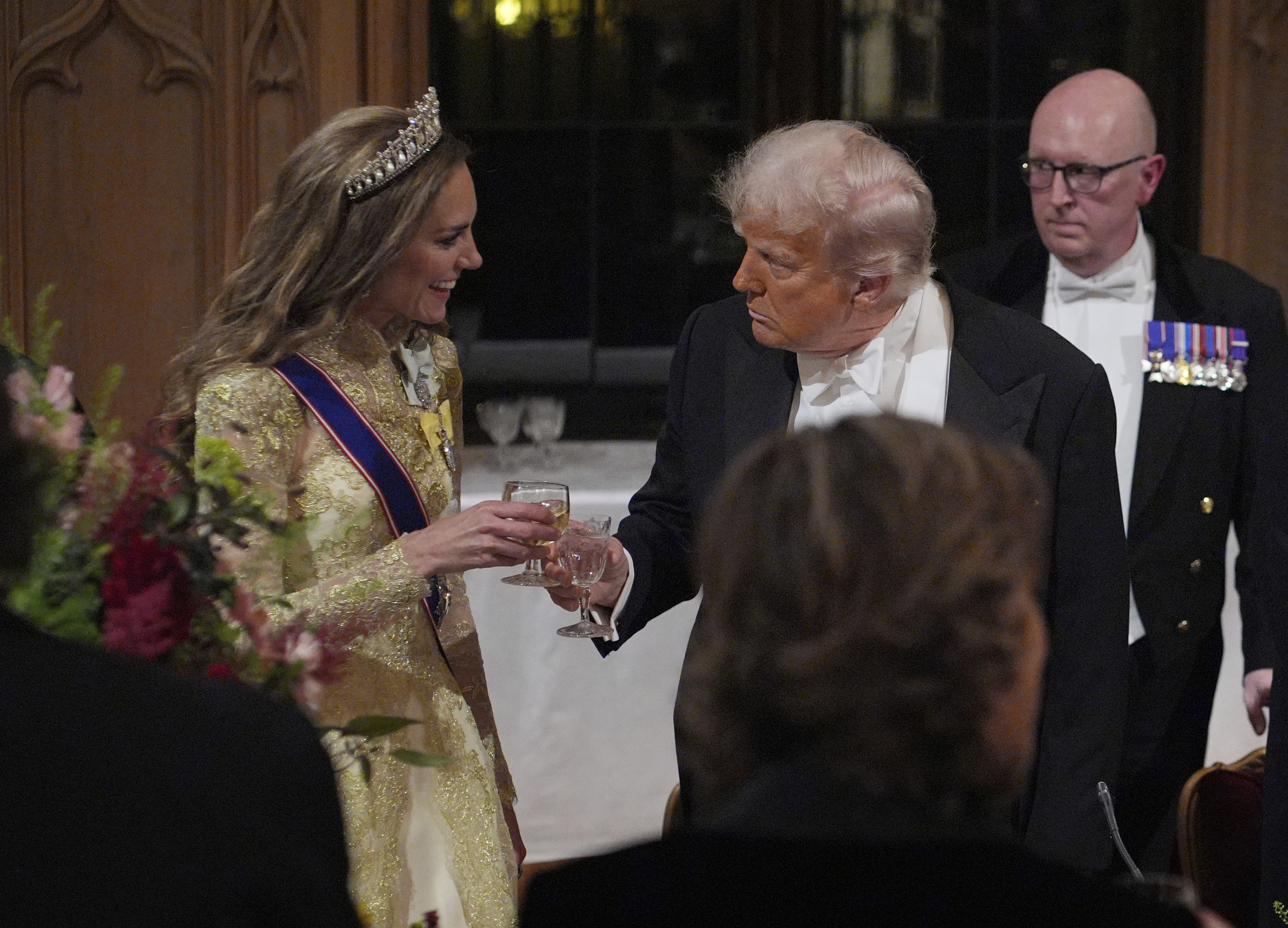 U.S. President Donald Trump toasts with Kate, Princess of Wales, toasts with U.S. President Donald Trump after his speech at the state banquet in Windsor Castle, England, on day one of U.S. President Donald Trump and First Lady Melania Trump's second state visit to the UK, Wednesday Sept. 17, 2025. (Yui Mok - Pool PA)